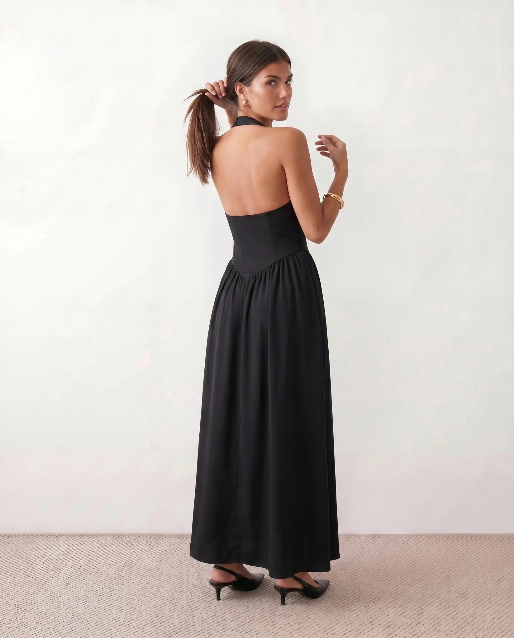 Aurora Basque Waist Halter Maxi Dress in Black — back view