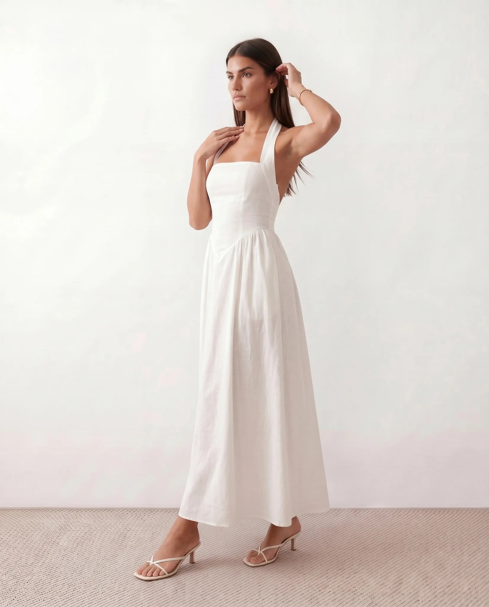 Aurora Basque Waist Halter Maxi Dress in White — side view