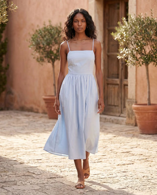 Stella Wedding Guest Spaghetti Strap Midi Dress in Light Blue — lifestyle movement view