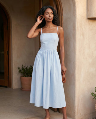 Stella Wedding Guest Spaghetti Strap Midi Dress in Light Blue — lifestyle occasion view