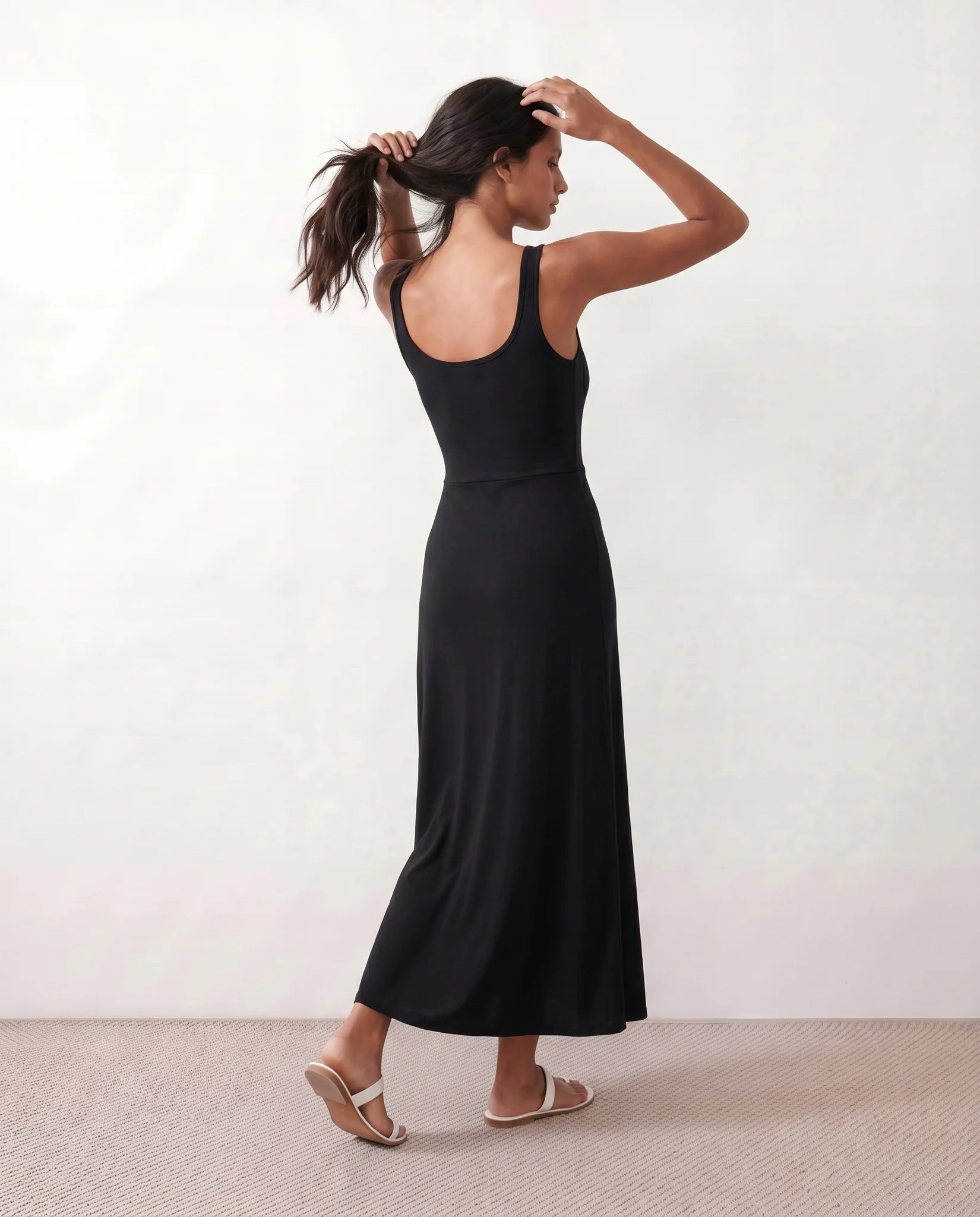 Cleo Ribbed Round Neck Maxi Dress in Black — back view