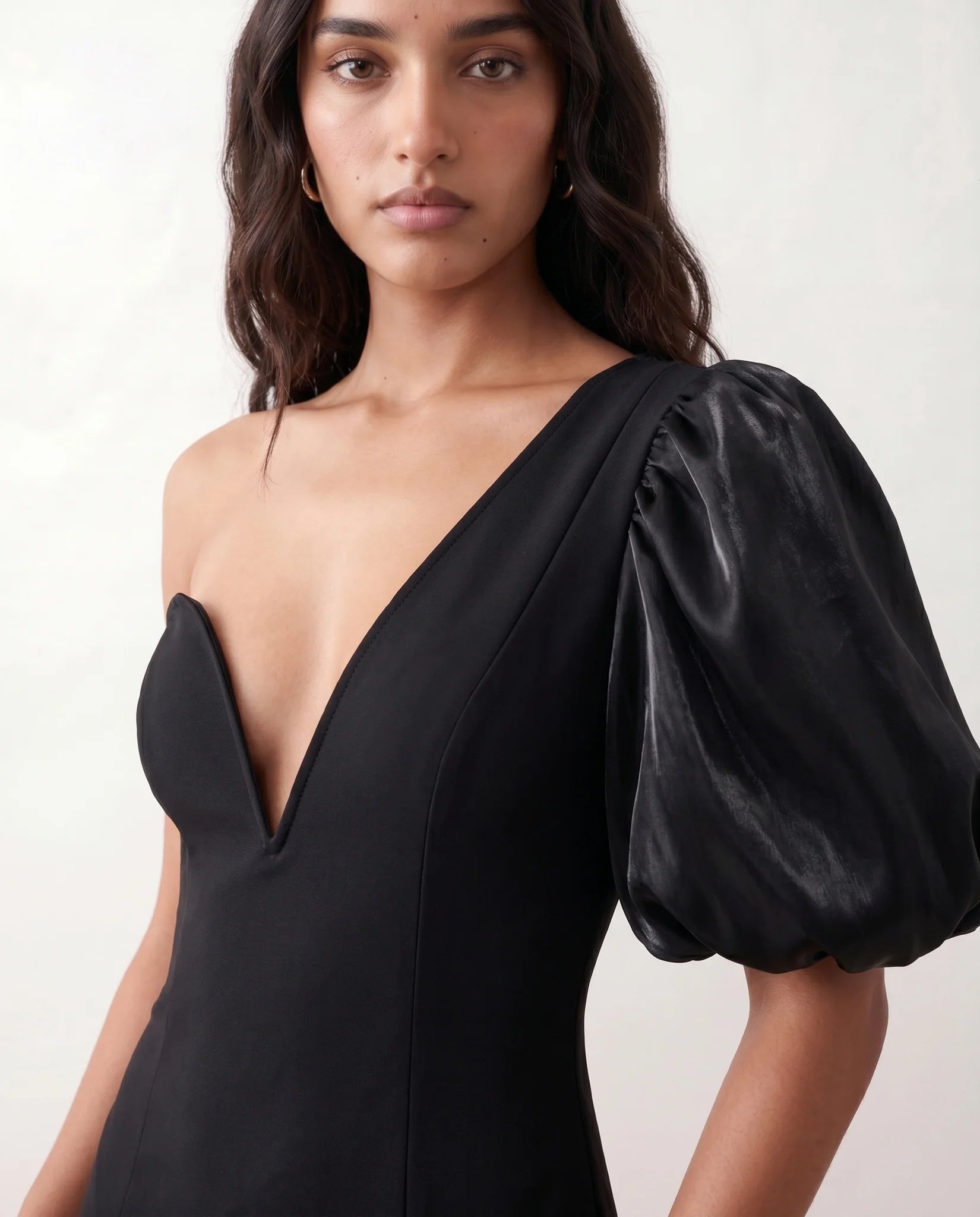 Avery Cocktail Asymmetric Neck Midi Dress in black — detail close-up