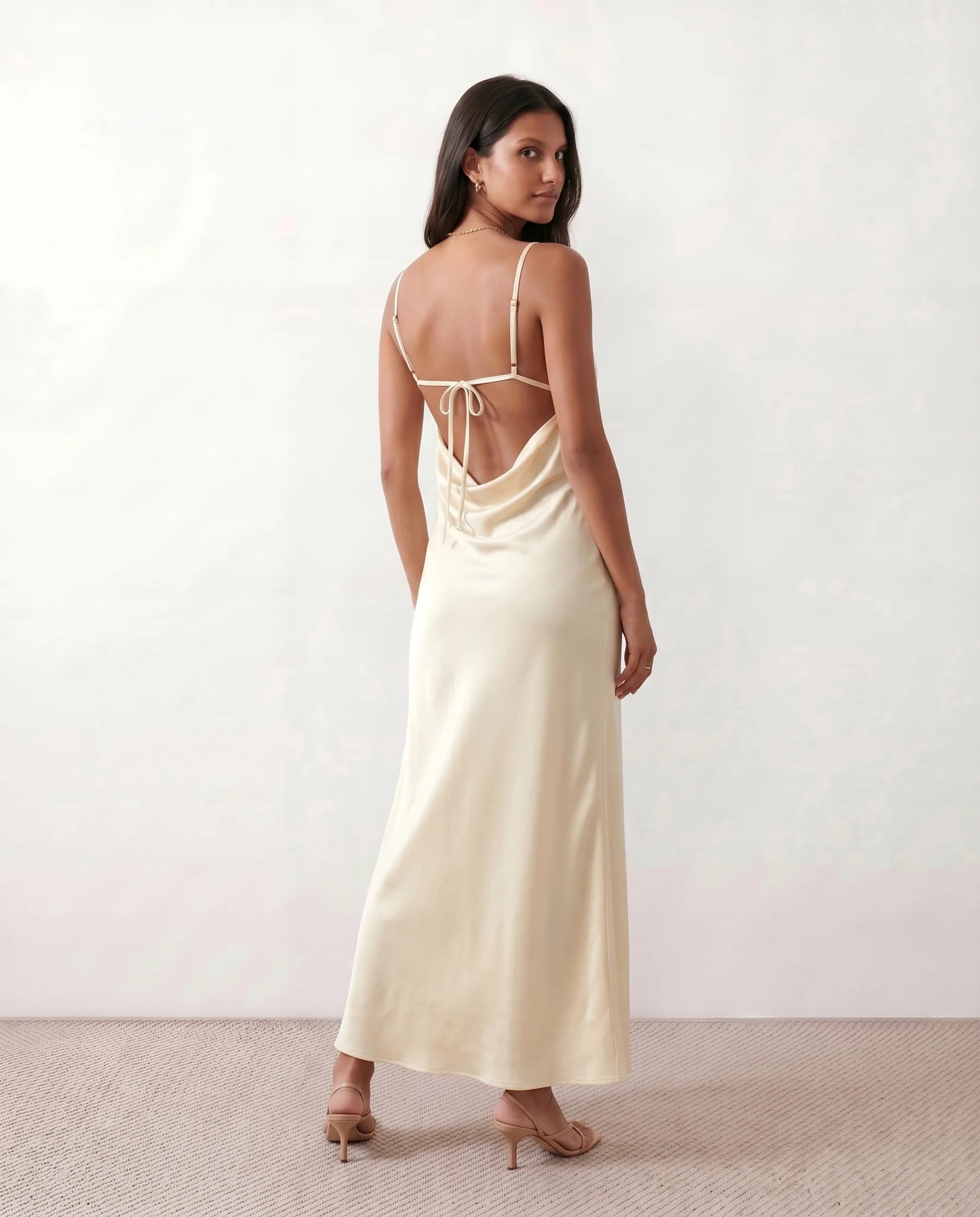 Gia Wedding Guest Glossy Maxi Dress in Beige — back view