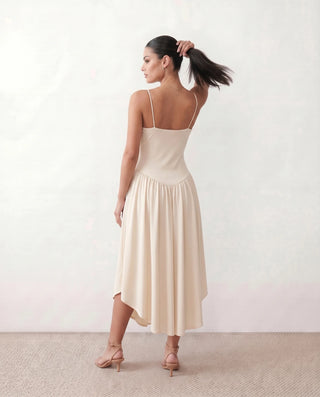 Willa Wedding Guest Spaghetti Strap Midi Dress in Beige — back view
