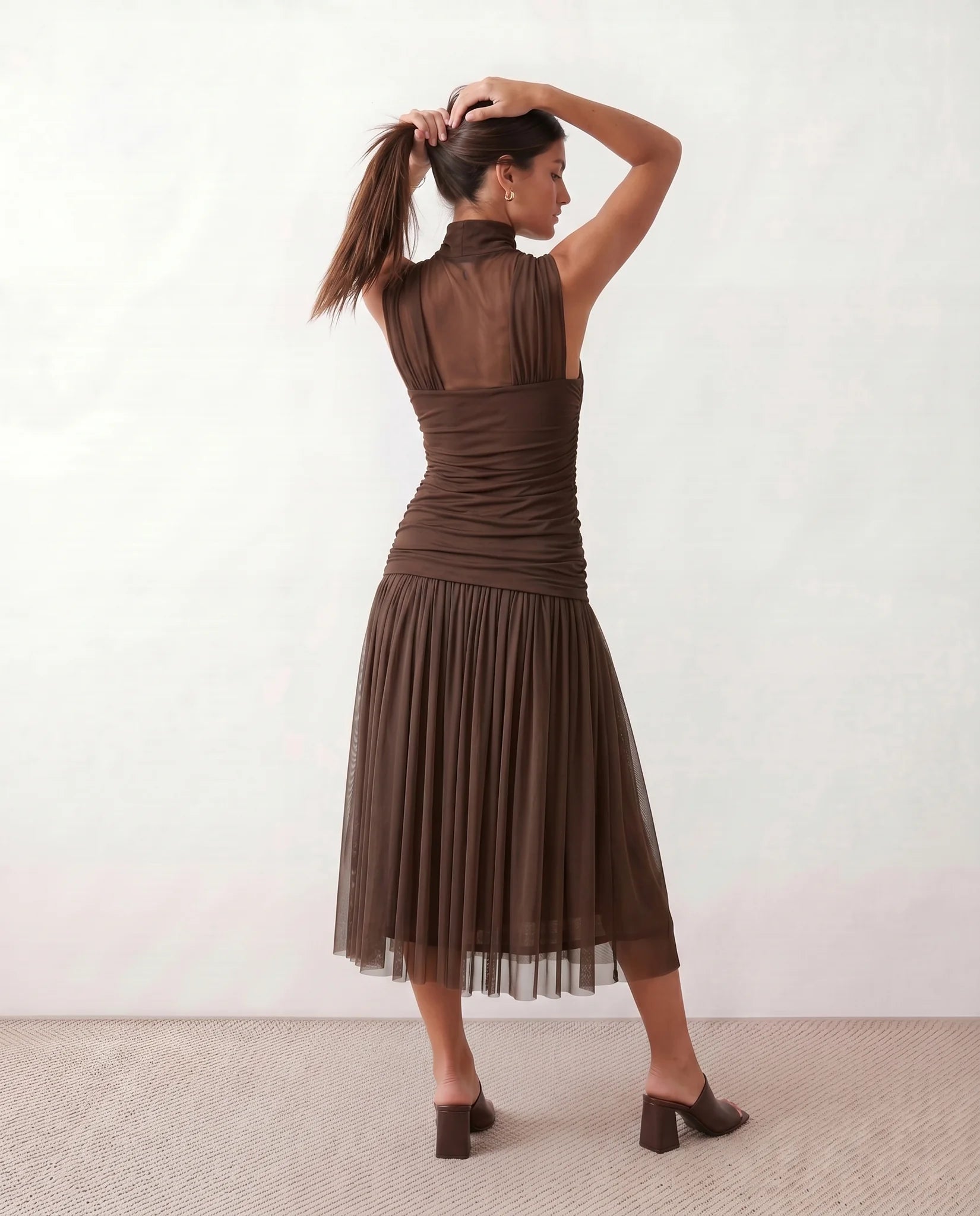 Jolie Cocktail Pleated Midi Dress in Brown — back view