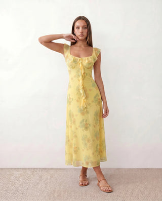 Thea Wedding Guest Floral Midi Dress in Yellow — front view