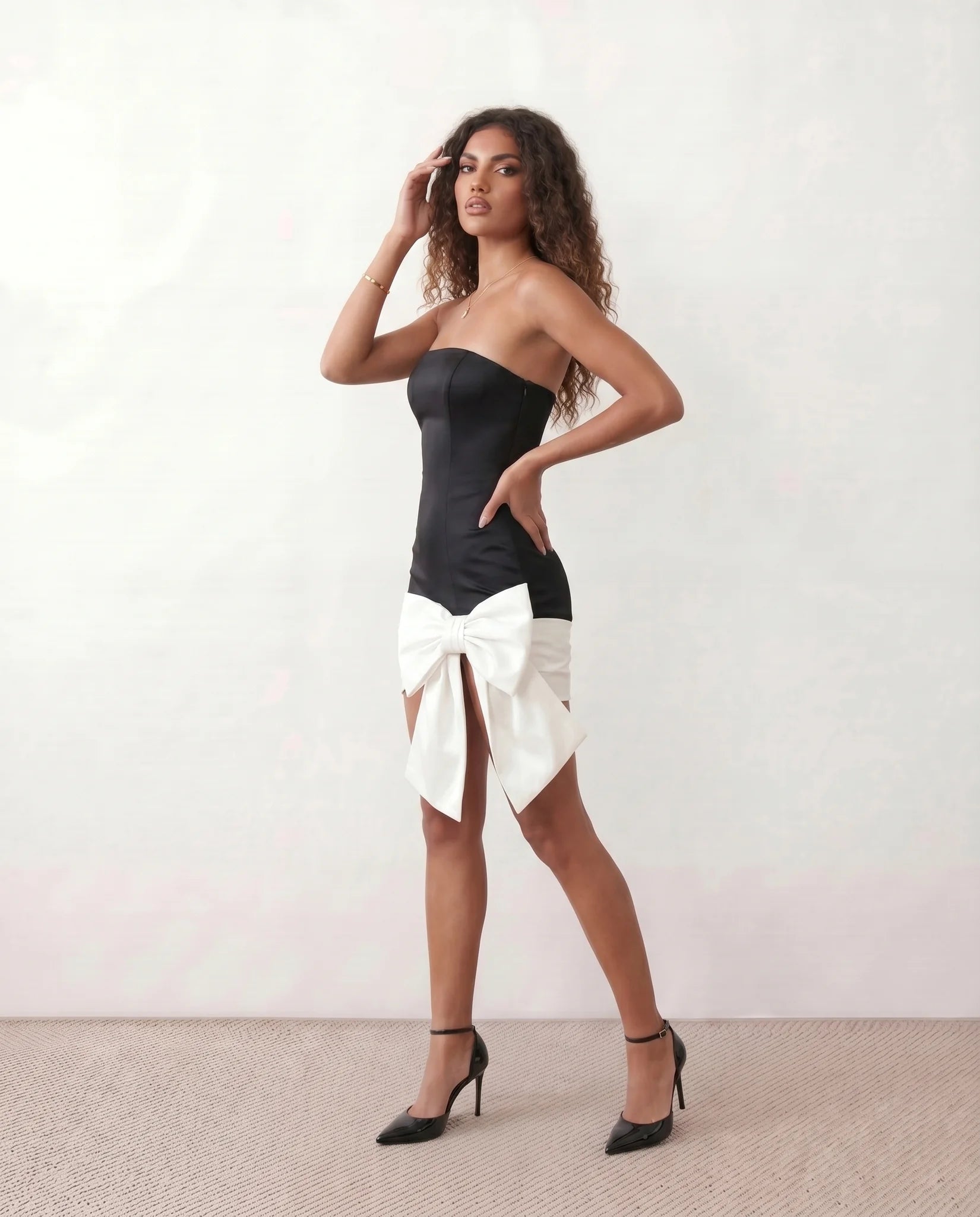 Odette Cocktail Strapless Mini Dress in black — side view
