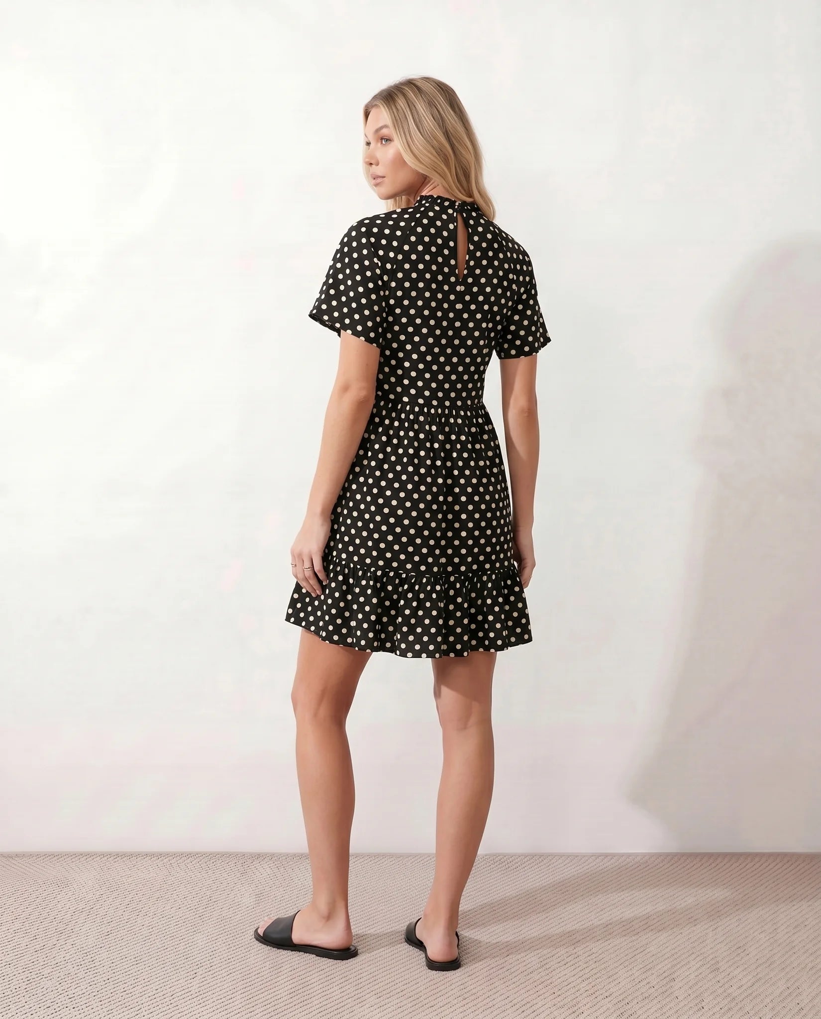 Romy Polka Dot Ruffle Detail Mini Dress in Dots Black — back view