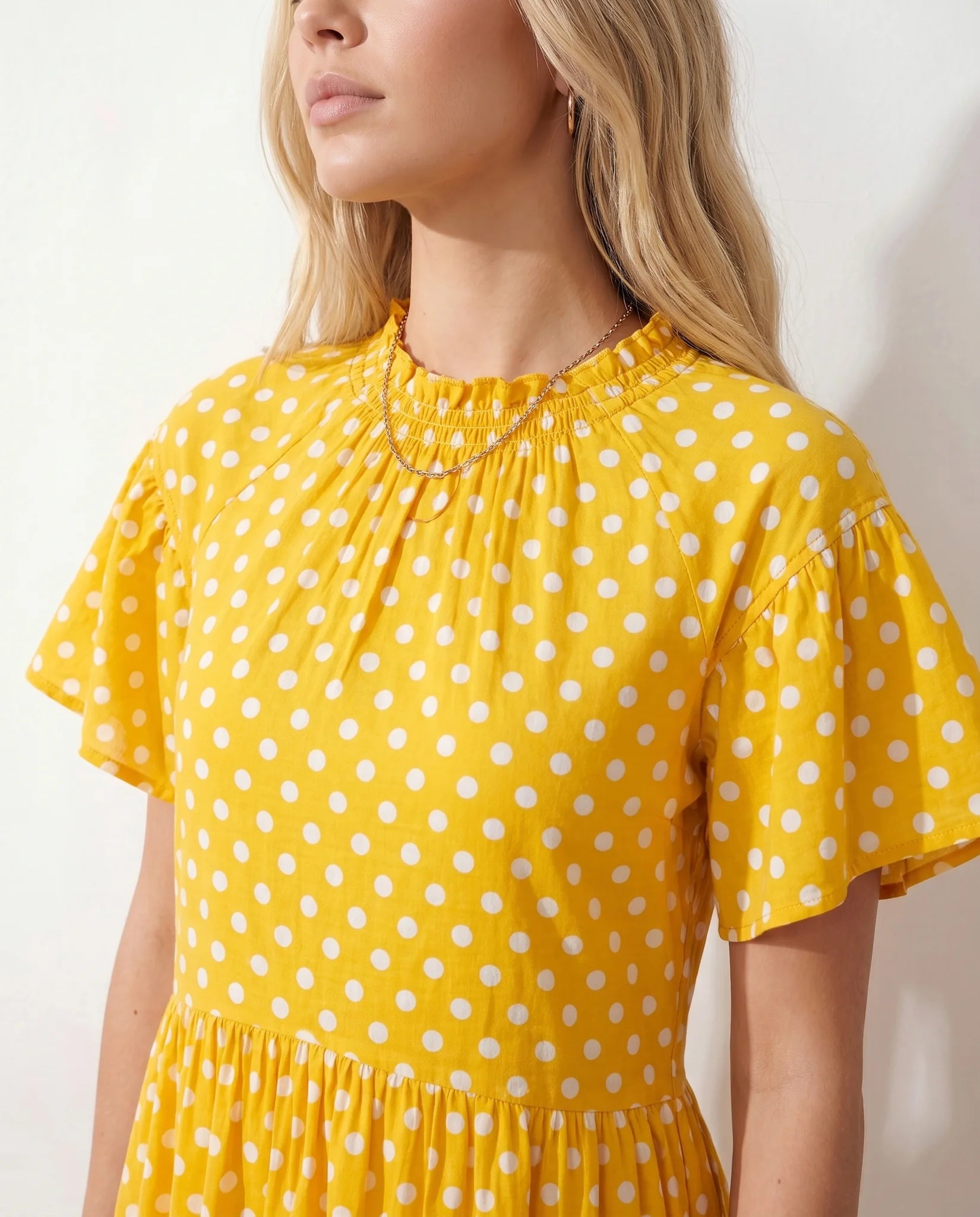 Romy Polka Dot Ruffle Detail Mini Dress in Dots Yellow — detail close-up