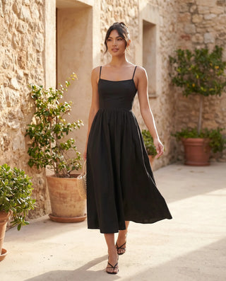 Layla Wedding Guest Spaghetti Strap Midi Dress in Black — lifestyle movement view
