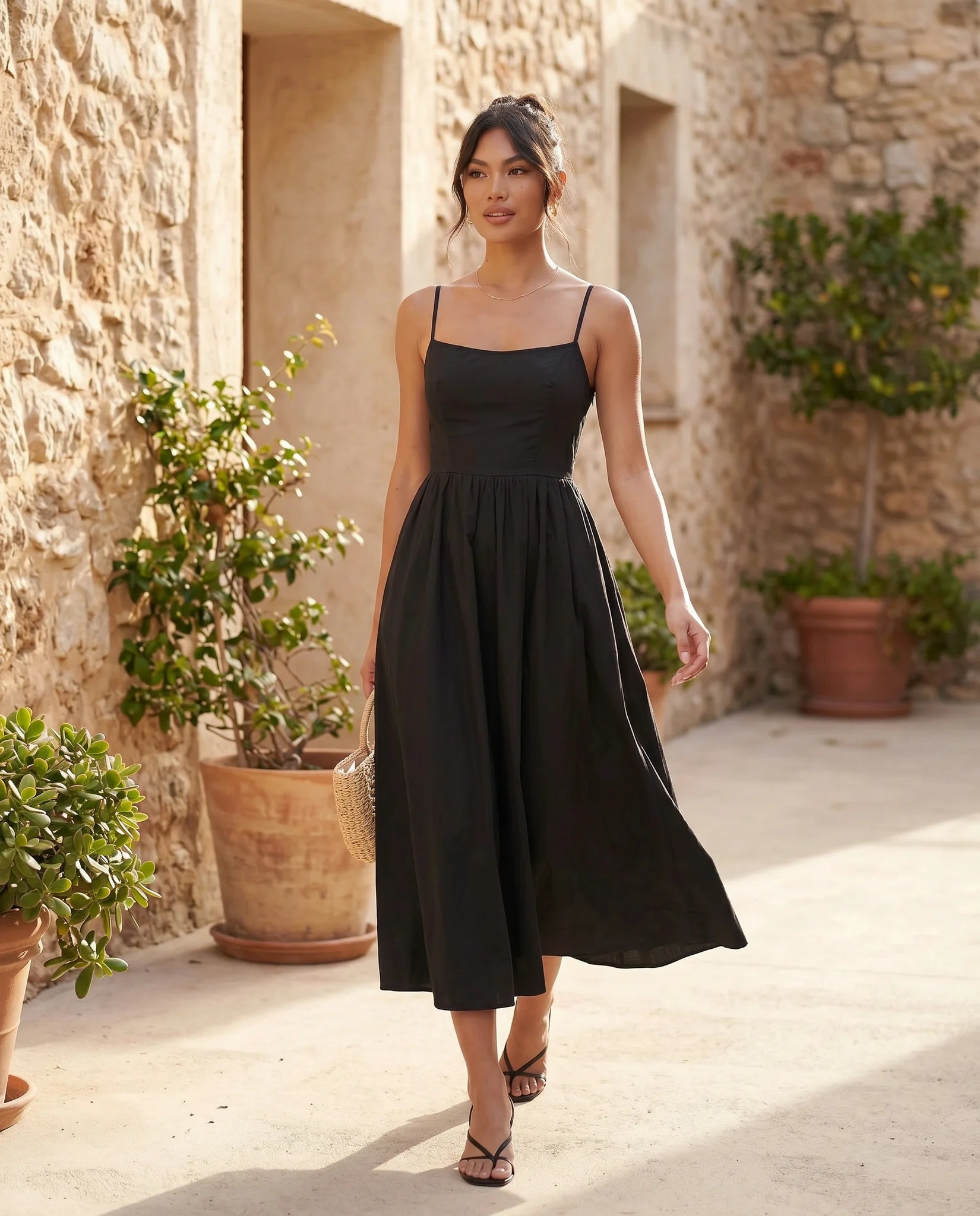 Layla Wedding Guest Spaghetti Strap Midi Dress in Black — lifestyle movement view