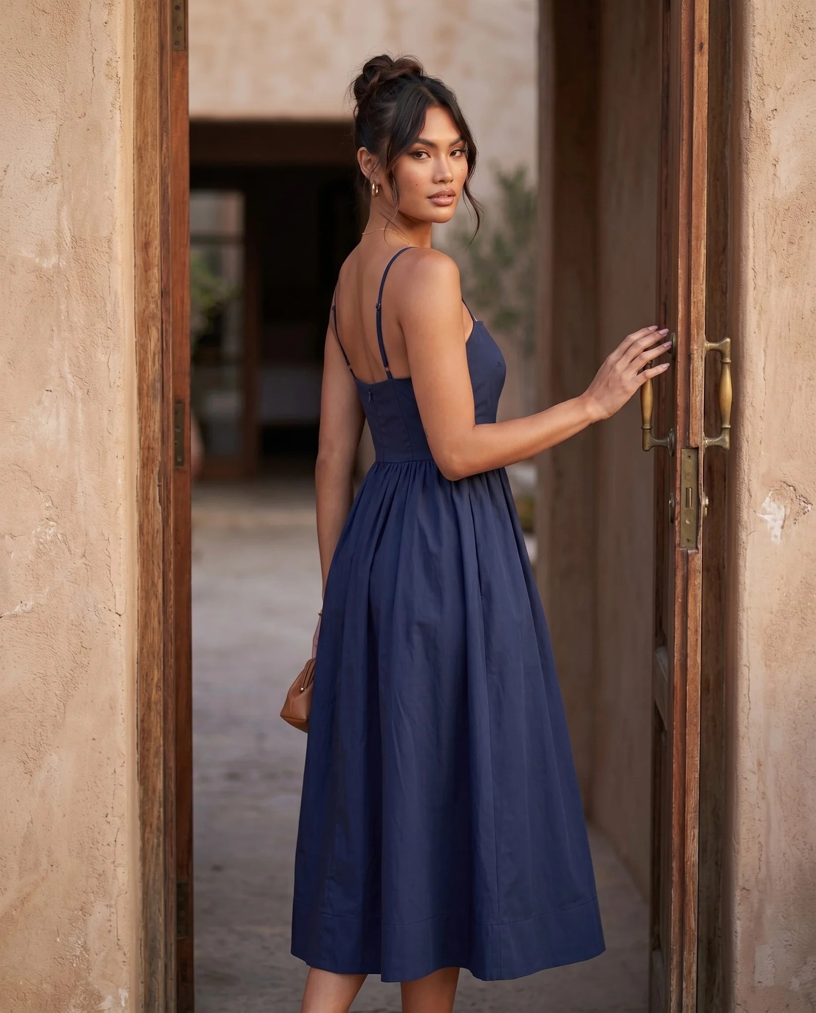 Layla Wedding Guest Spaghetti Strap Midi Dress in Navy — lifestyle occasion view