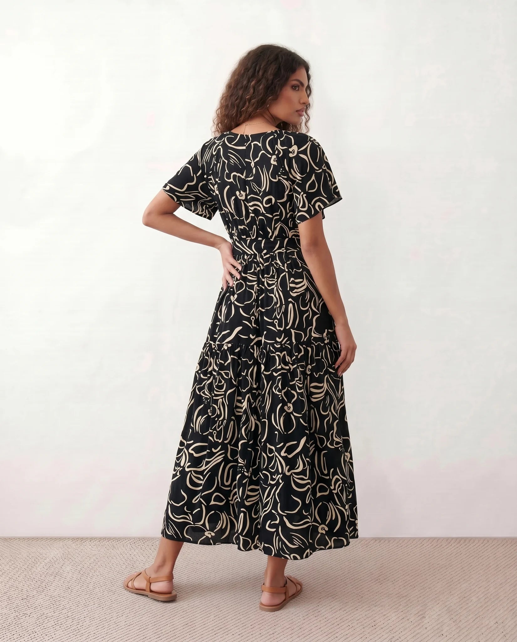 Vera Abstract Print Tie Detail Maxi Dress in Abstract Black — back view