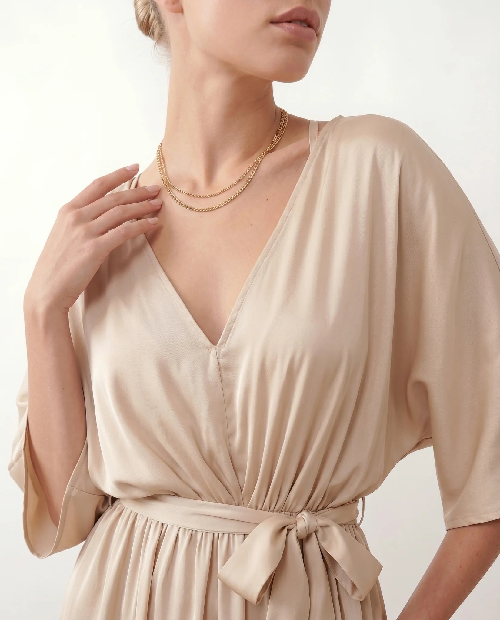Rhea Wedding Guest V-Neck Maxi Dress in Beige — detail close-up