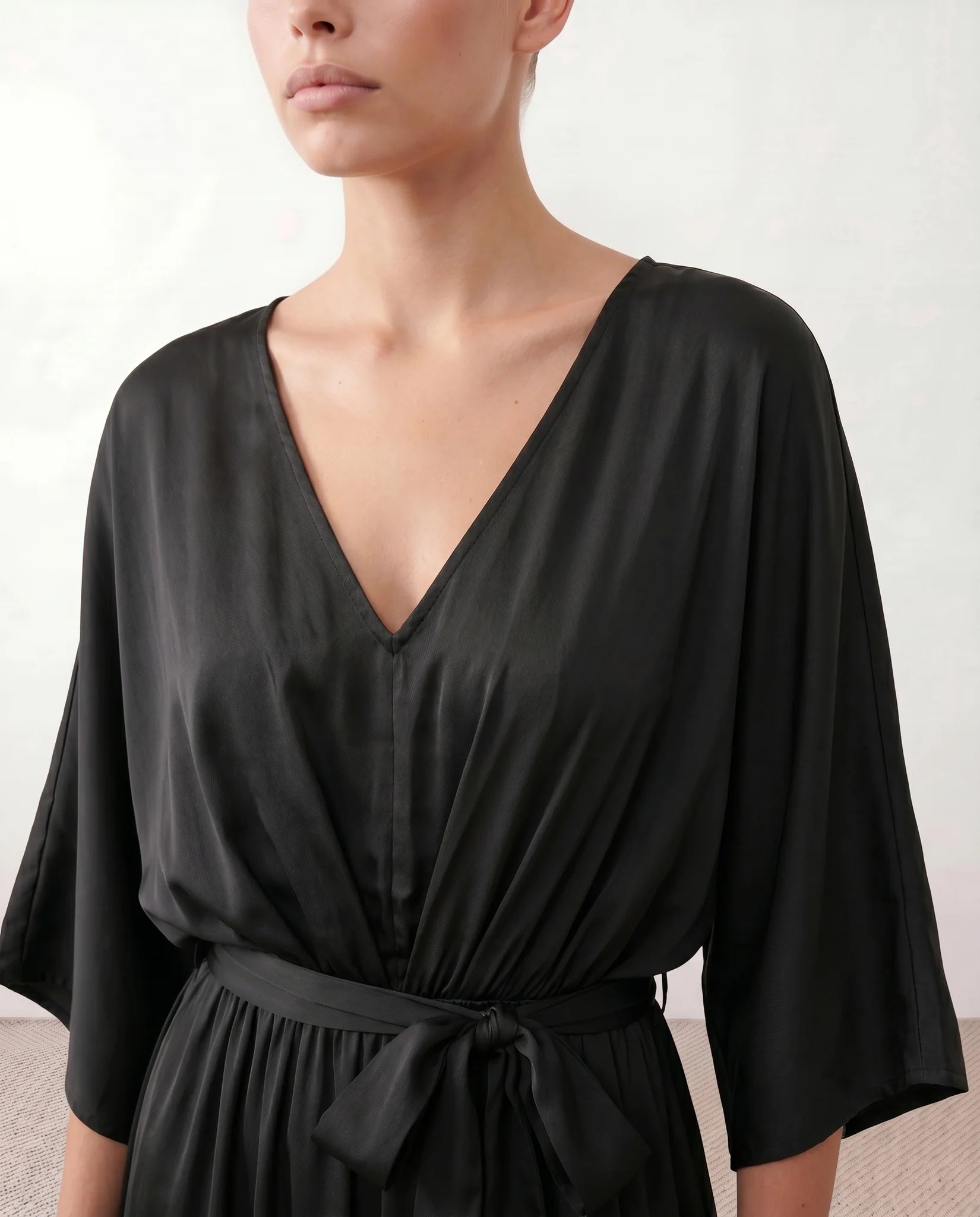 Rhea Wedding Guest V-Neck Maxi Dress in Black — detail close-up