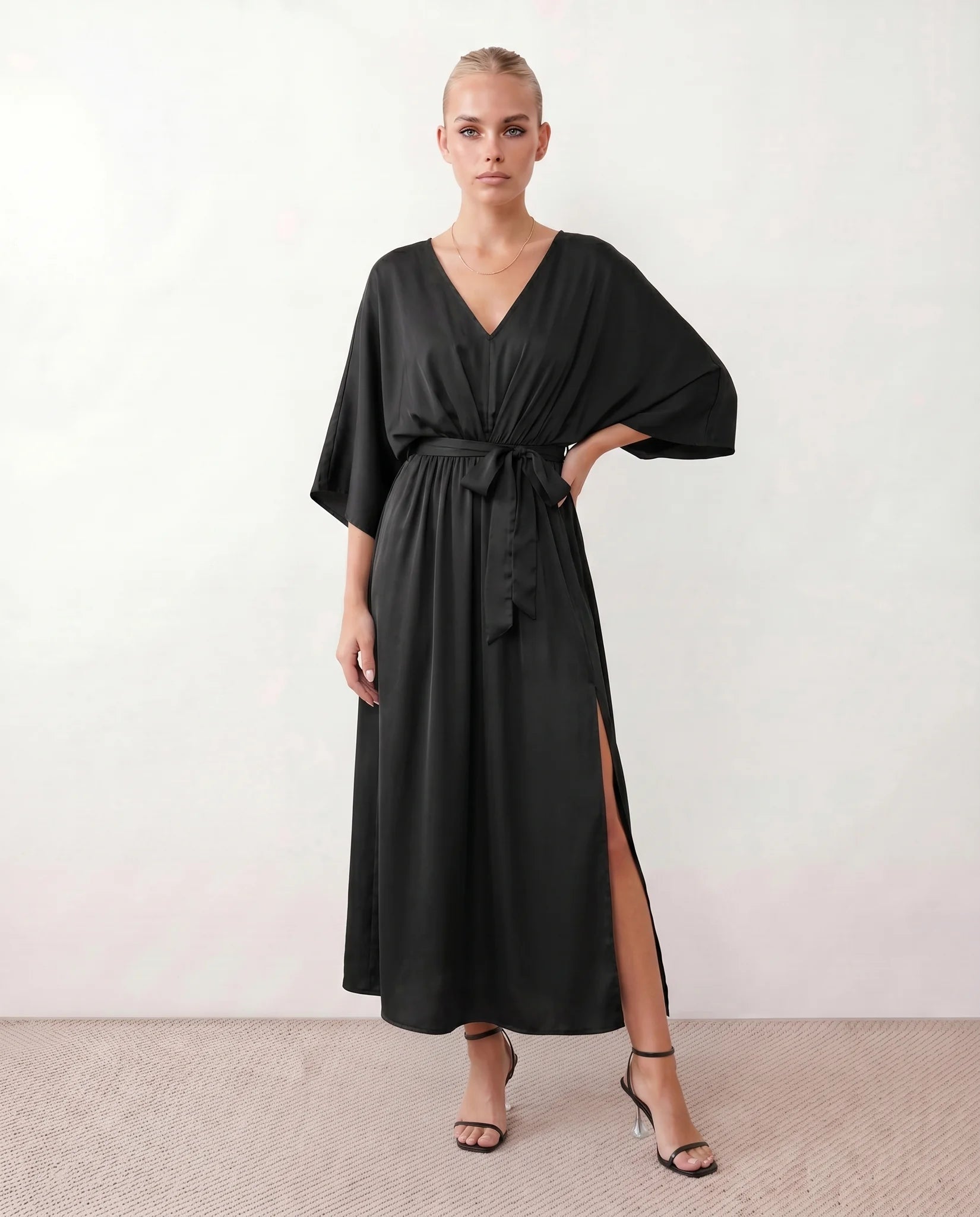 Rhea Wedding Guest V-Neck Maxi Dress in Black — front view