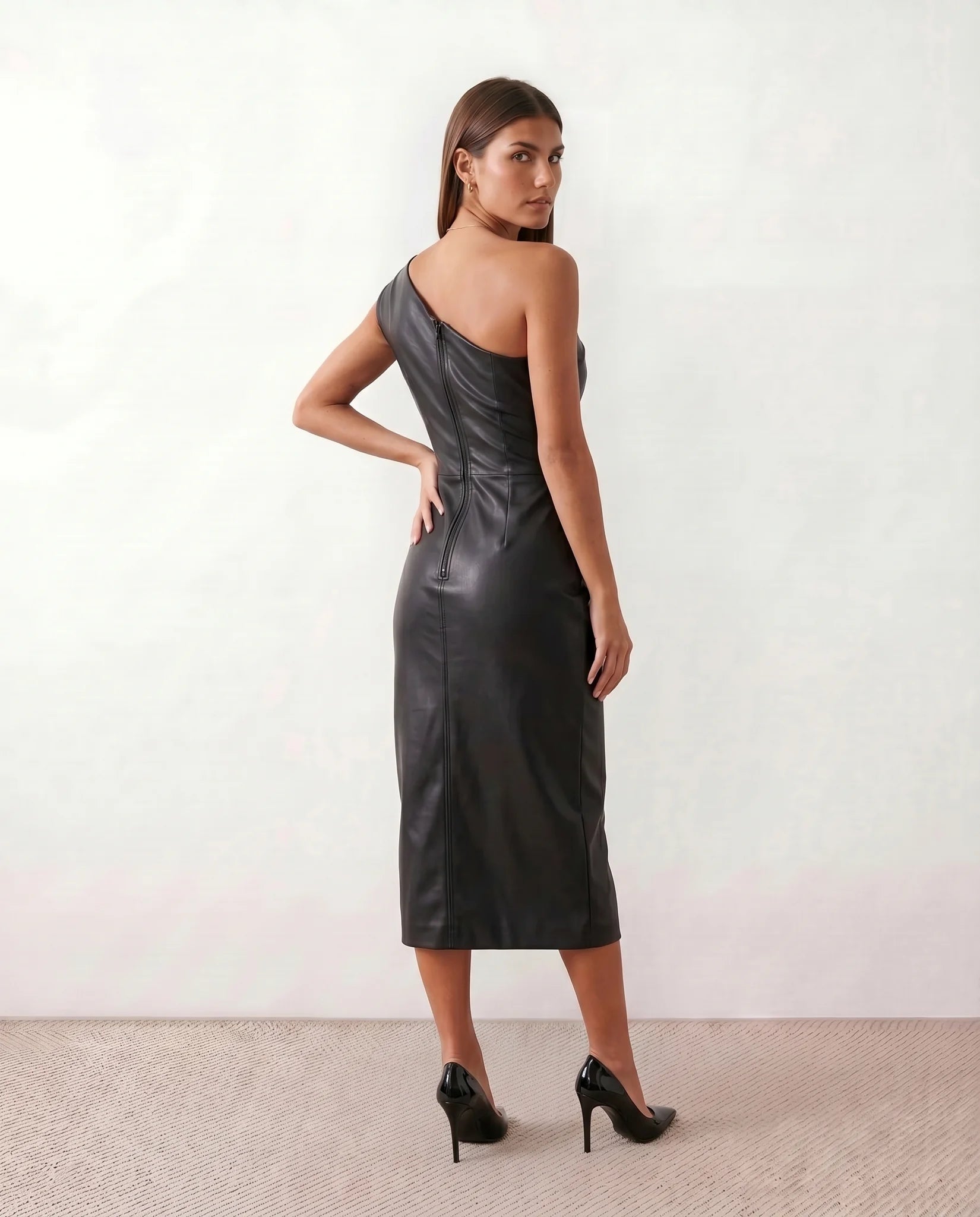 Celia Cocktail Faux Leather Midi Dress in Black — back view