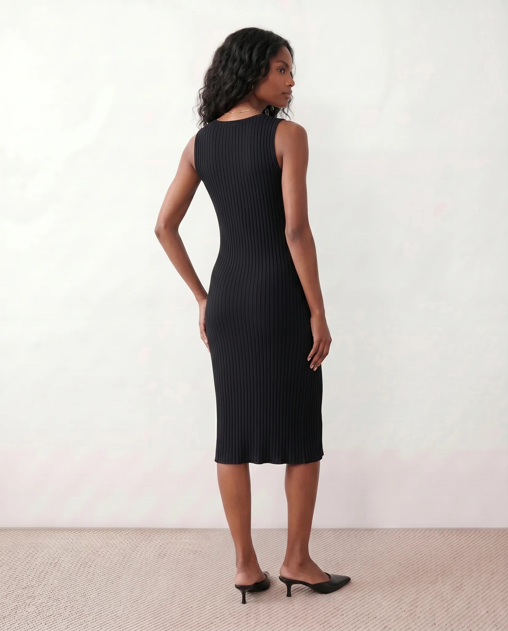 Raina Cocktail Ribbed Midi Dress in Black — back view