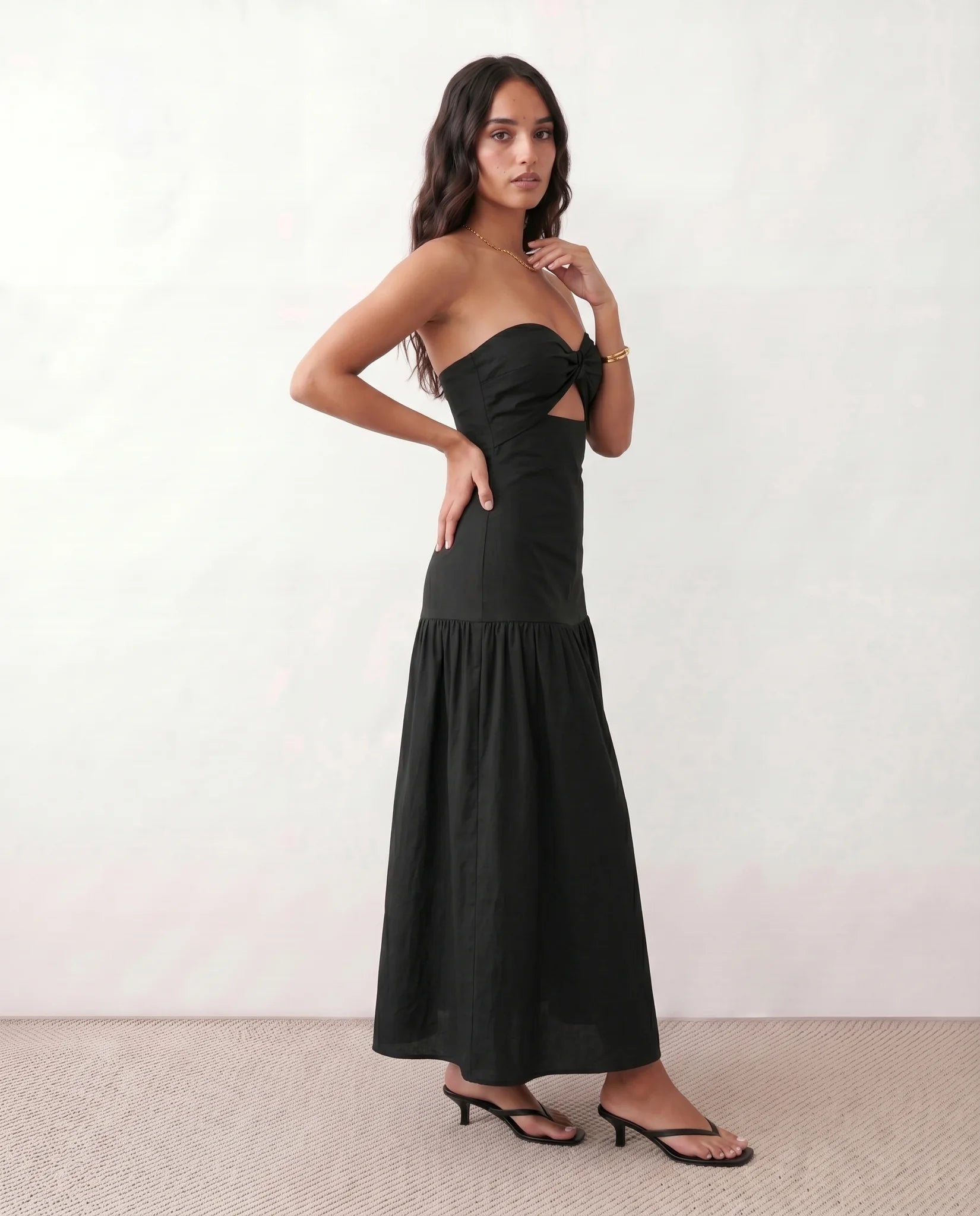 Lyra Cocktail Strapless Maxi Dress in Black — side view