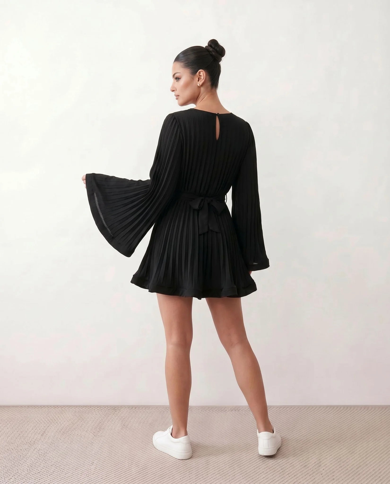 Caroline Cocktail Pleated Mini Dress in Black — back view