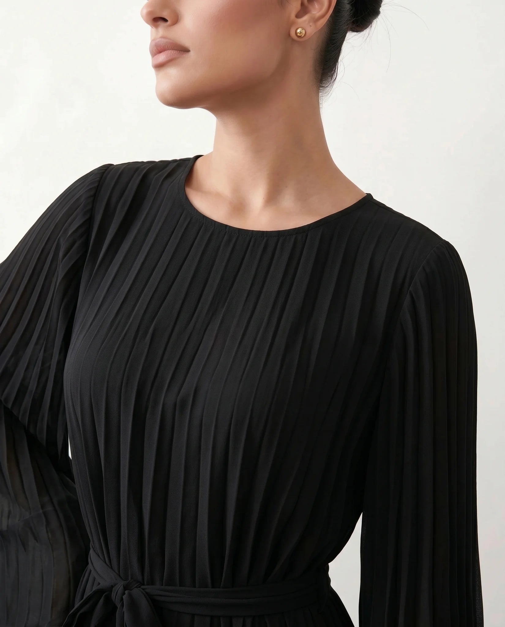 Caroline Cocktail Pleated Mini Dress in Black — detail close-up