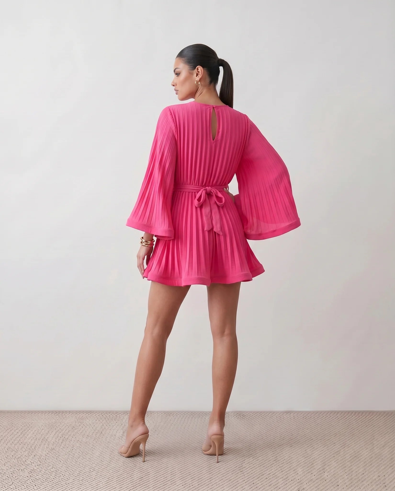 Caroline Cocktail Pleated Mini Dress in Pink — back view