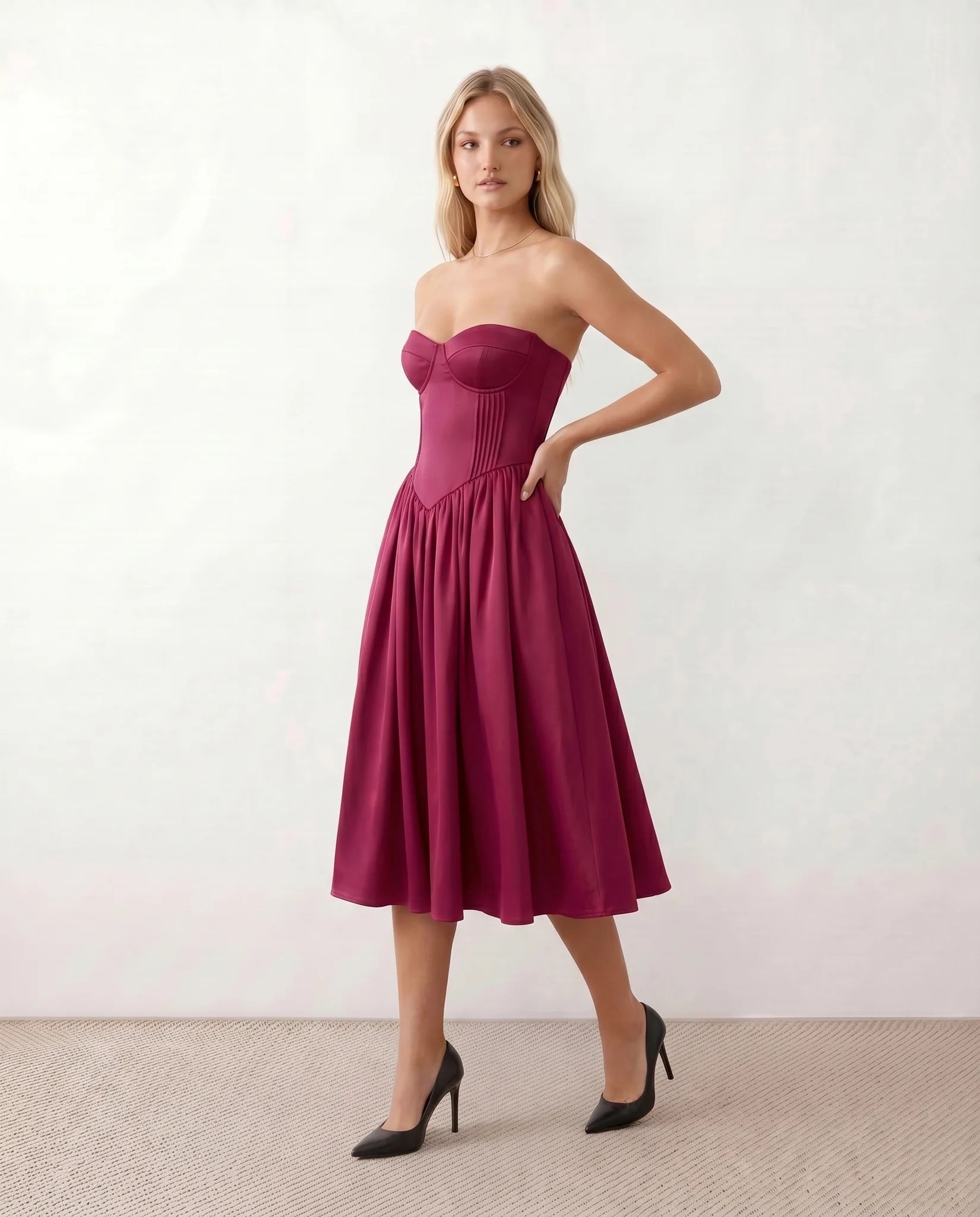 Vicenta Basque Waist Strapless Midi Dress in Burgundy — side view