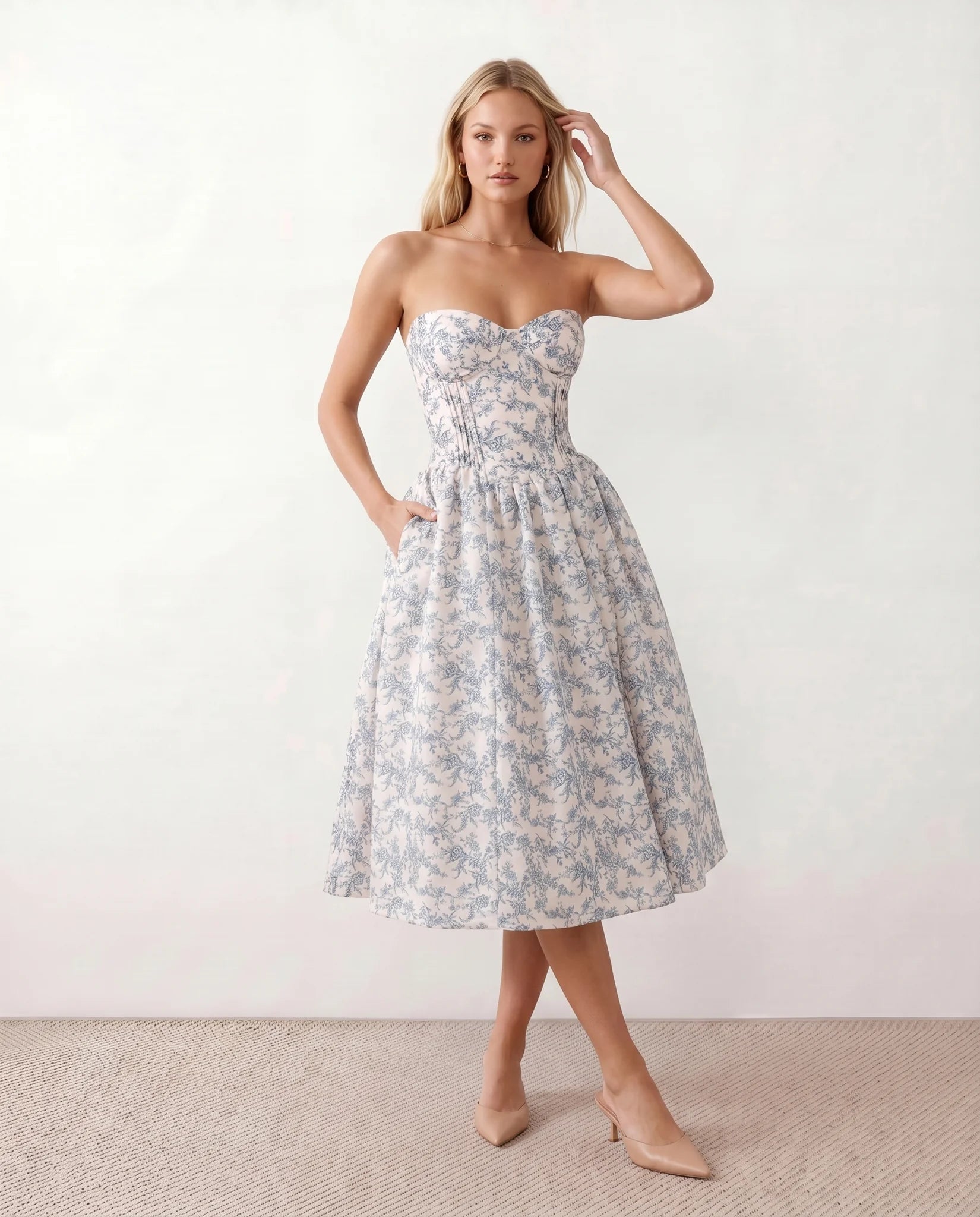 Vicenta Basque Waist Strapless Midi Dress in Floral Blue — front view