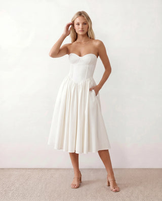 Vicenta Basque Waist Strapless Midi Dress in White — front view