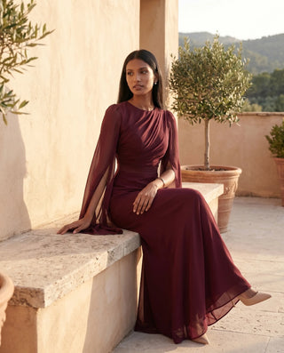 Kamila Wedding Guest Boat Neck Maxi Dress in Burgundy — lifestyle seated view