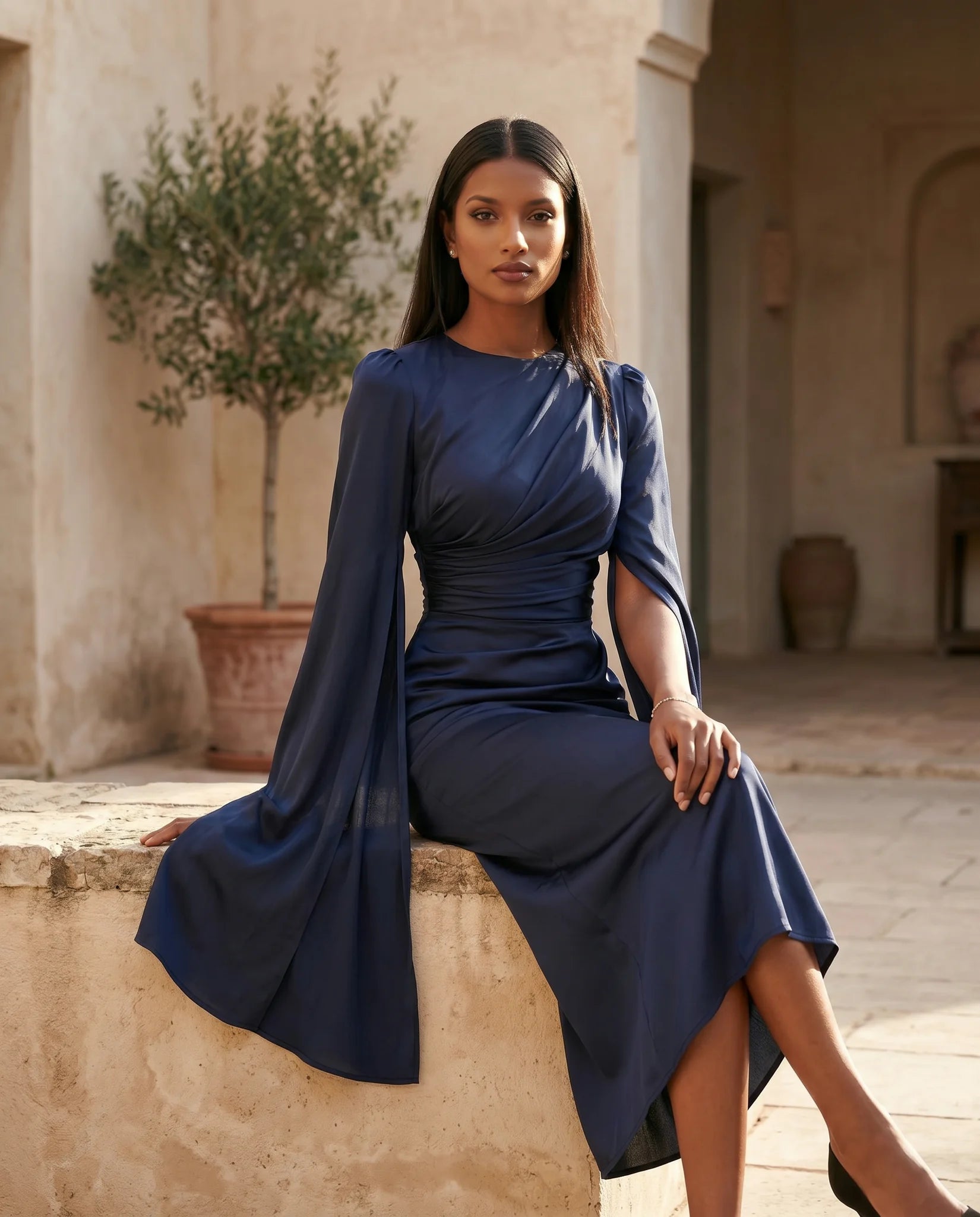 Kamila Wedding Guest Boat Neck Maxi Dress in Navy — lifestyle seated view