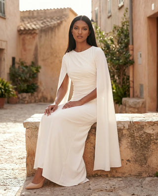 Kamila Wedding Guest Boat Neck Maxi Dress in White — lifestyle seated view
