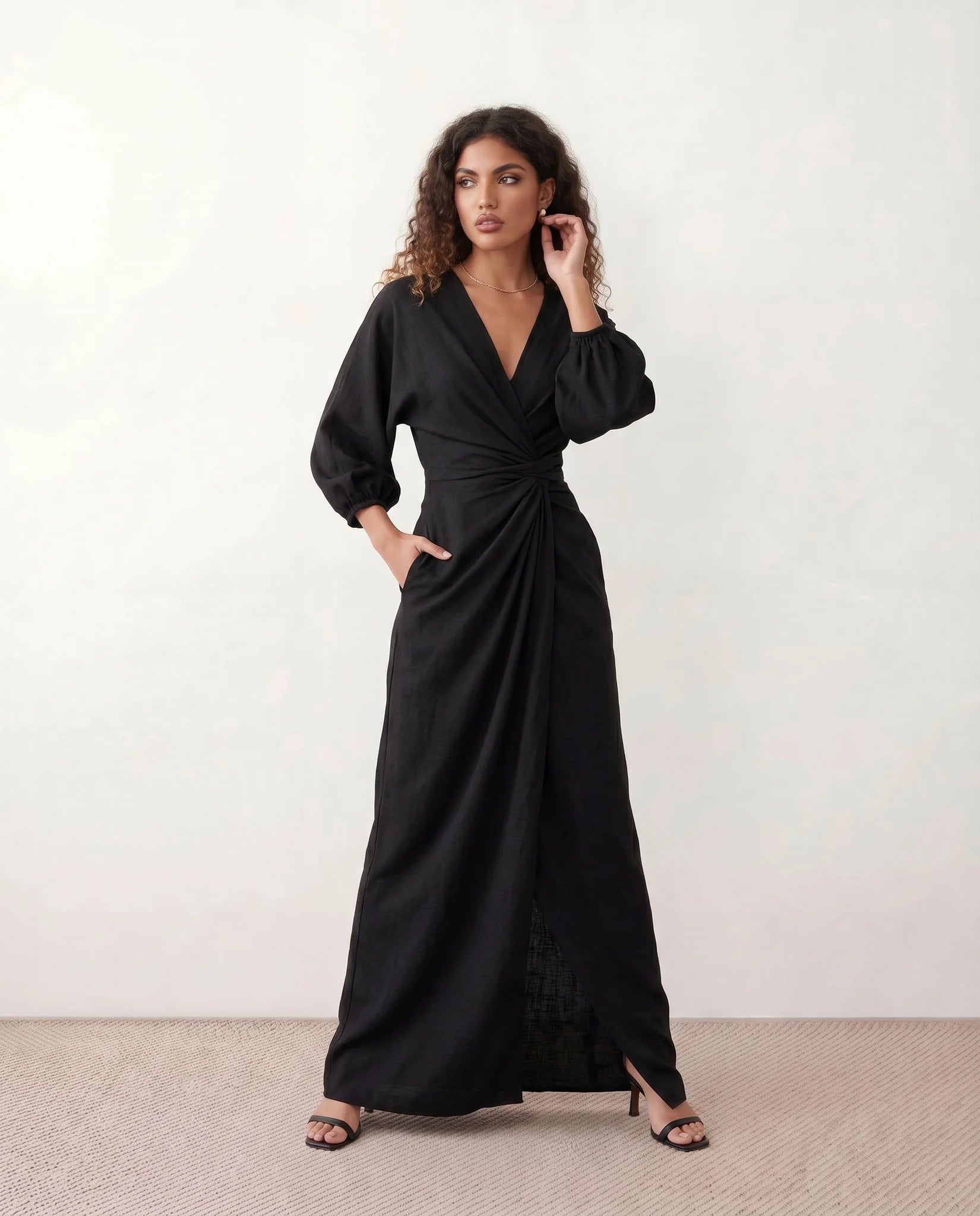 Nelida Wedding Guest Wrap Neck Maxi Dress in Black — front view
