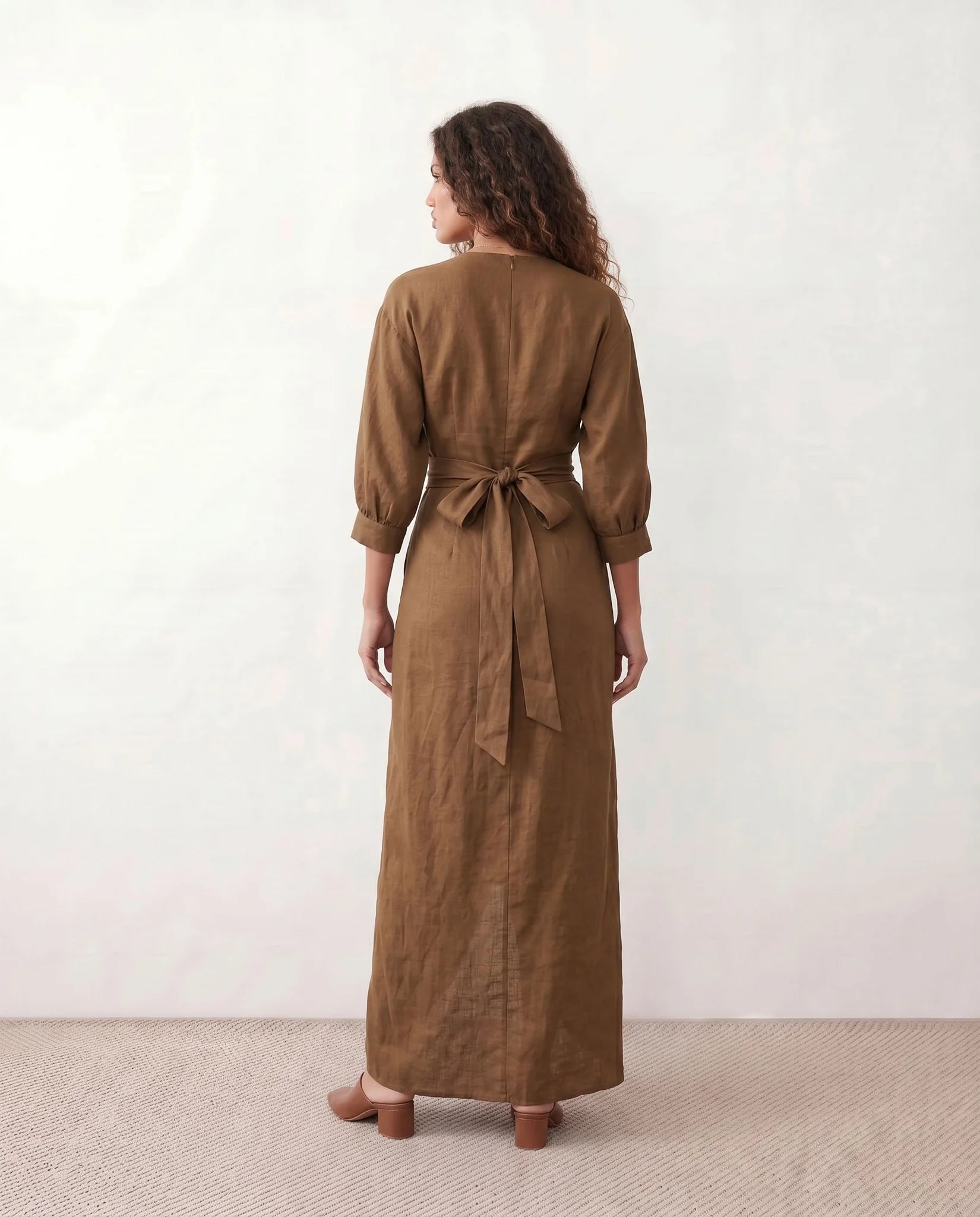 Nelida Wedding Guest Wrap Neck Maxi Dress in Brown — back view