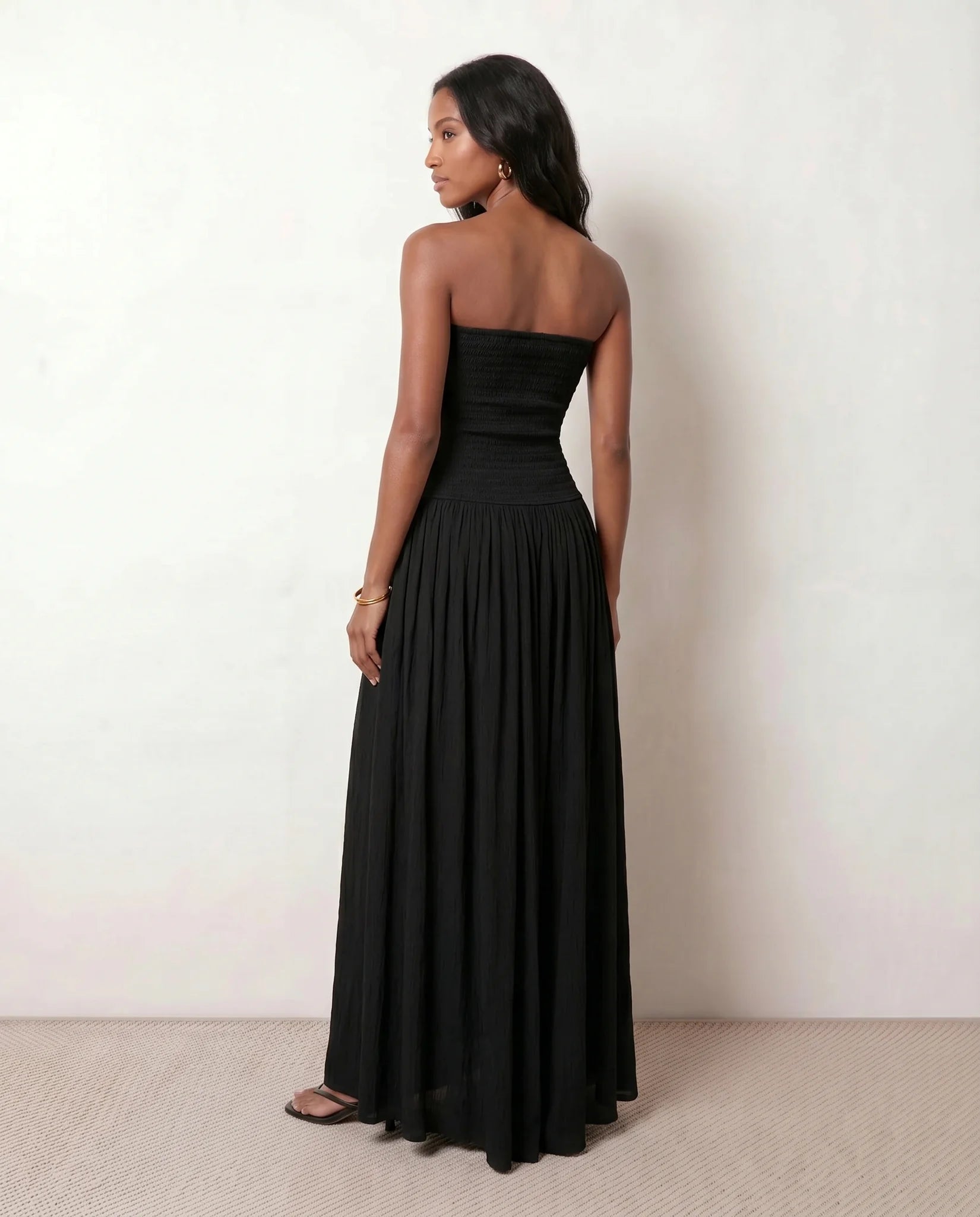 Zofia Wedding Guest Strapless Maxi Dress in Black — back view