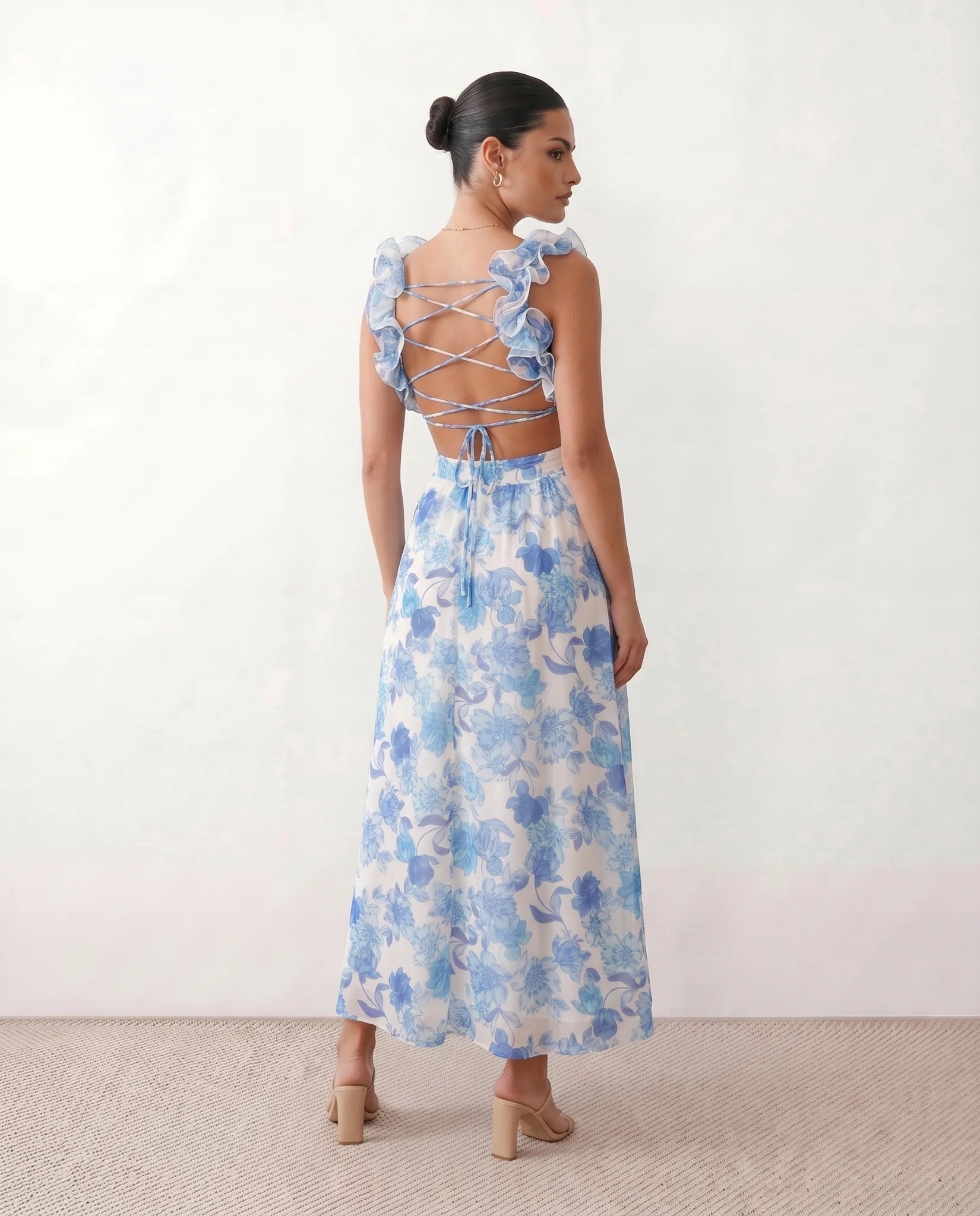 Giedre Wedding Guest V-Neck Midi Dress in Floral Blue — back view