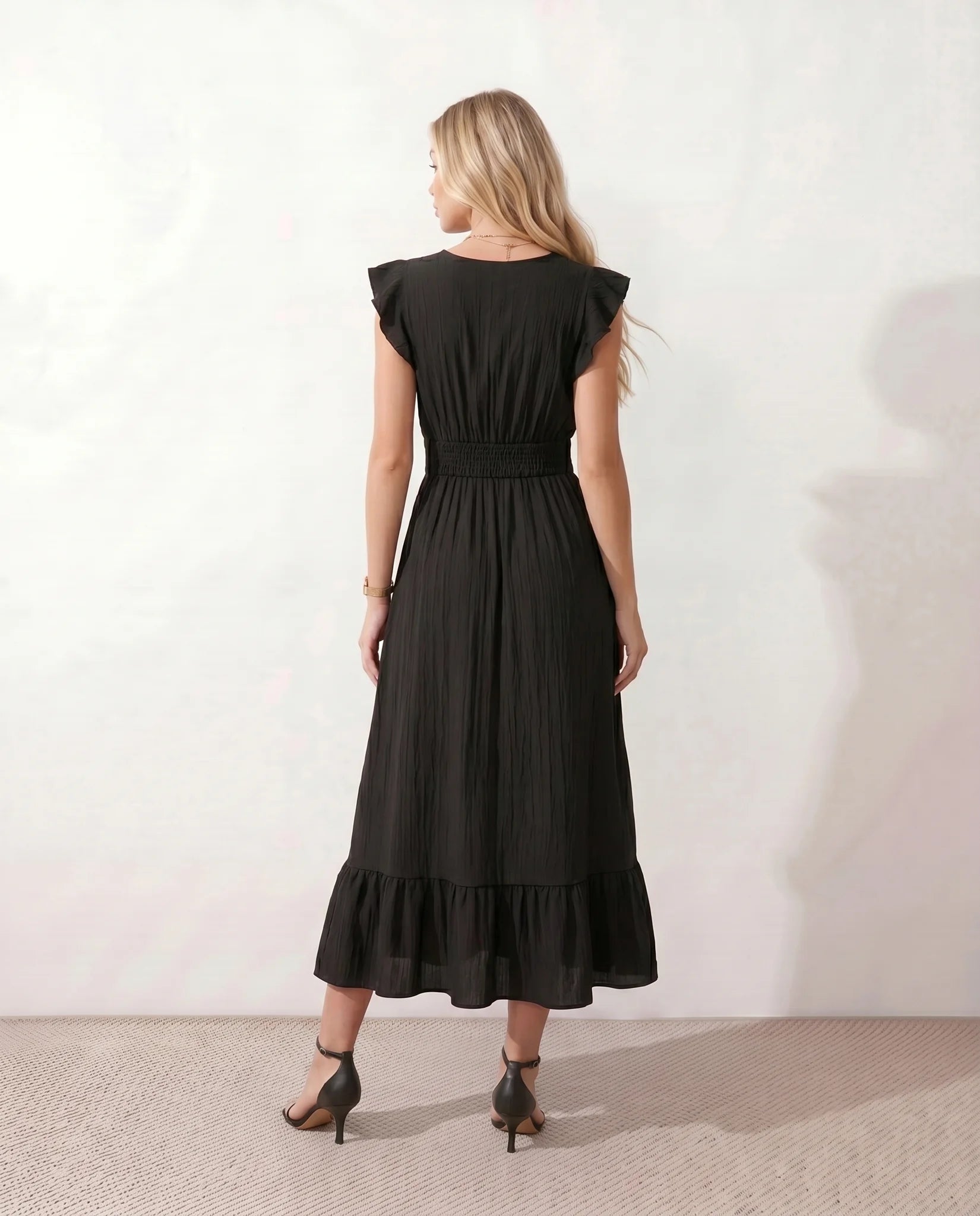 Mirtha Low Back Ruffle Detail Midi Dress in Black — back view
