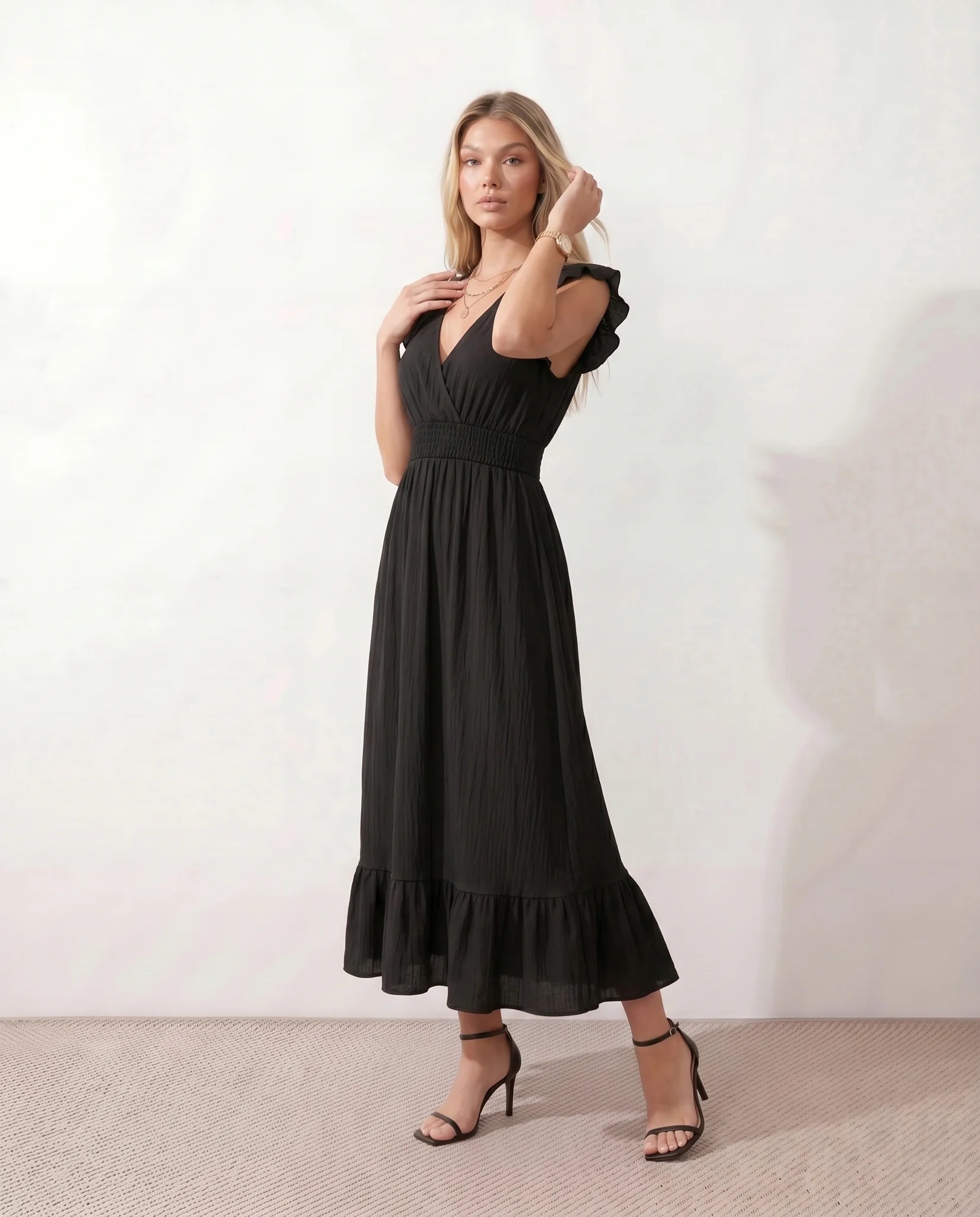 Mirtha Low Back Ruffle Detail Midi Dress in Black — side view