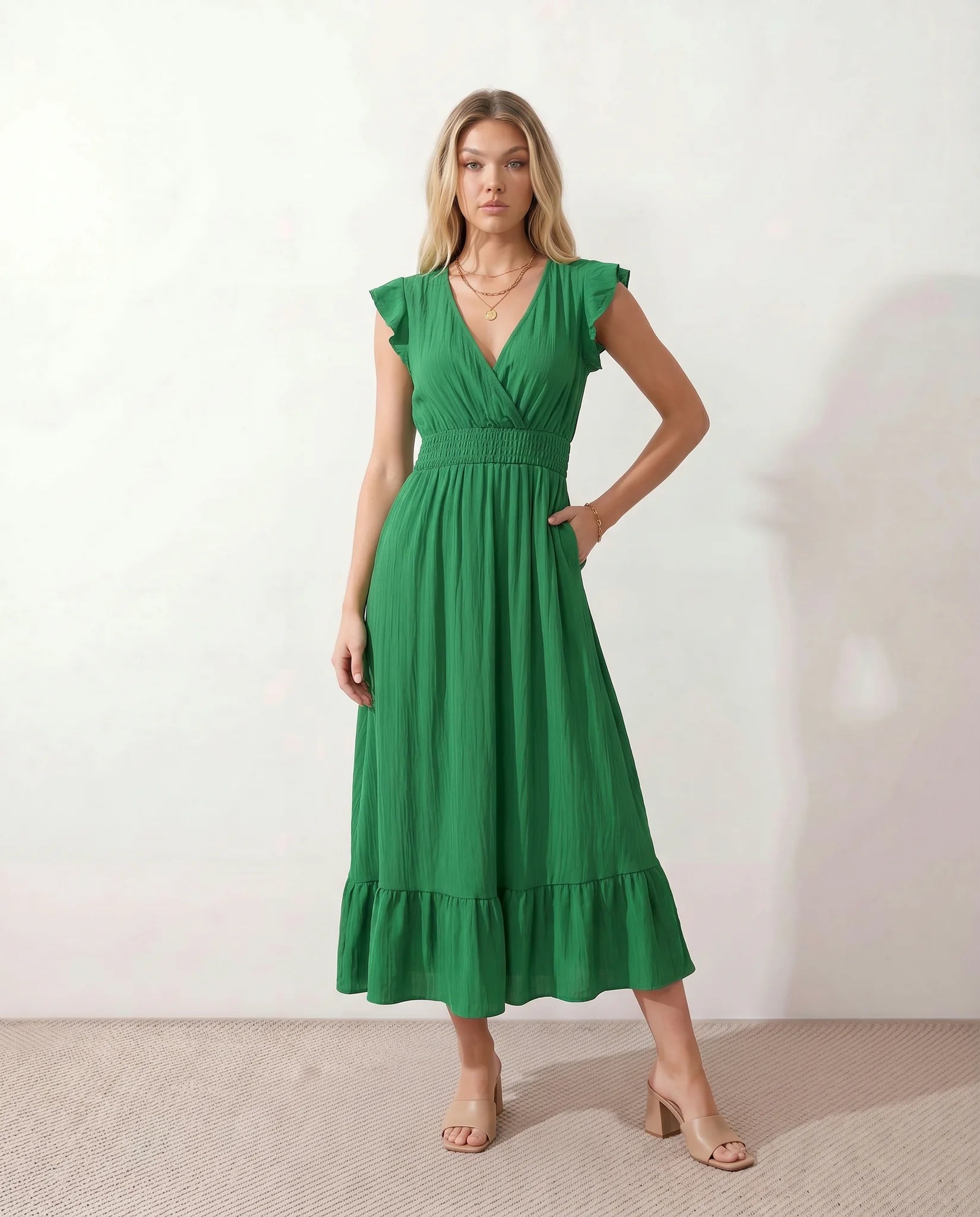 Mirtha Low Back Ruffle Detail Midi Dress in Emerald — front view