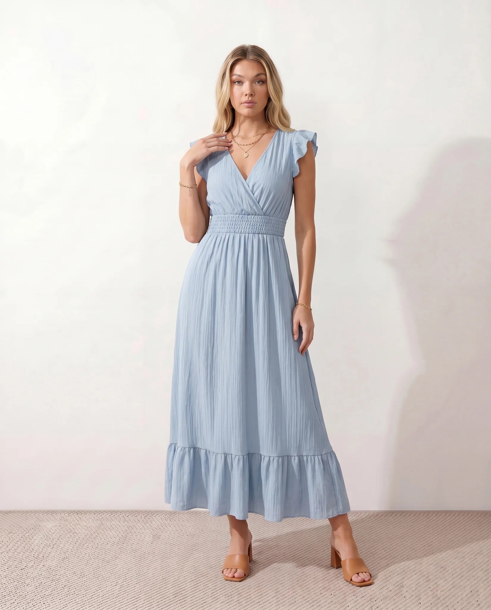 Mirtha Low Back Ruffle Detail Midi Dress in Light Blue — front view