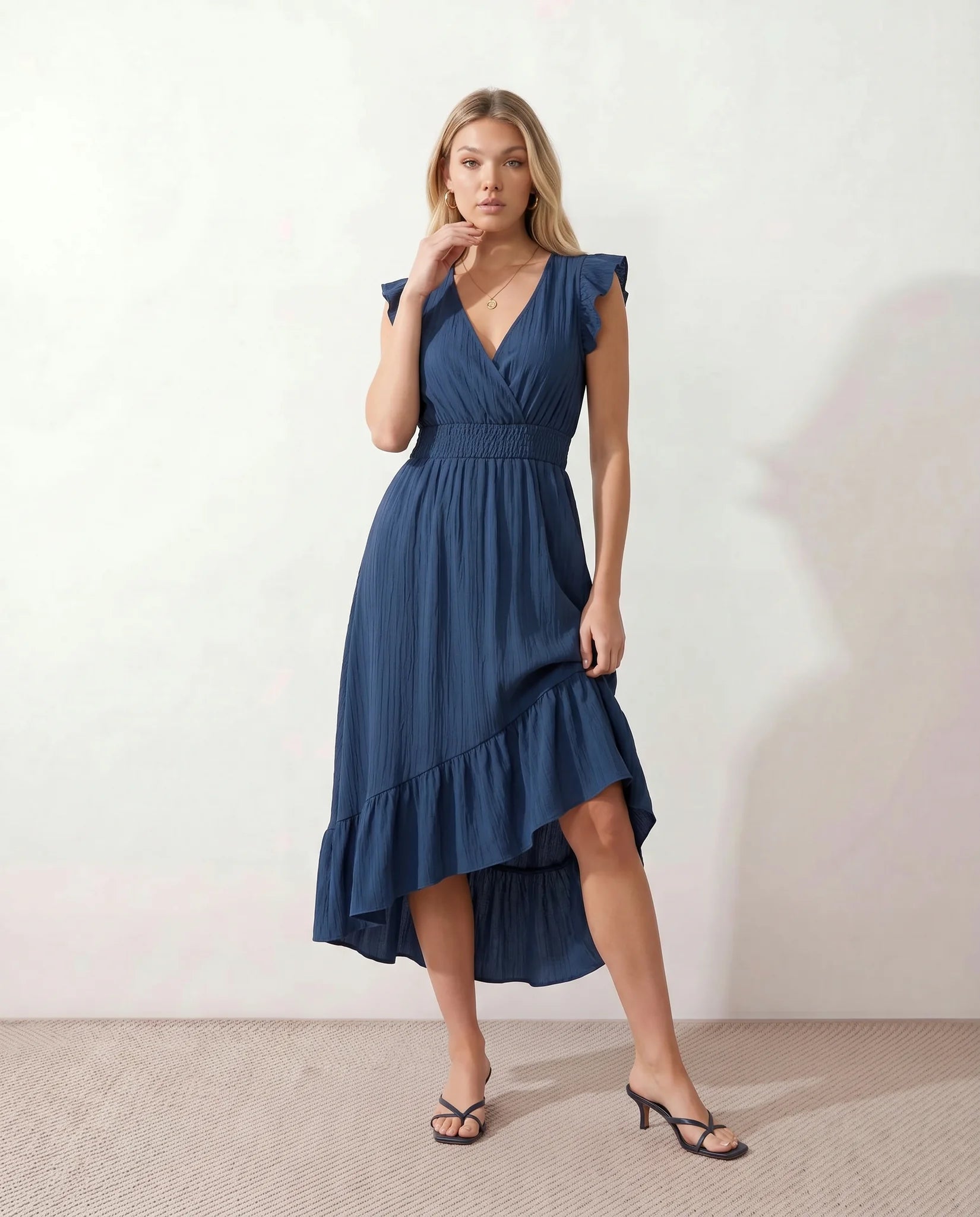 Mirtha Low Back Ruffle Detail Midi Dress in Navy — front view