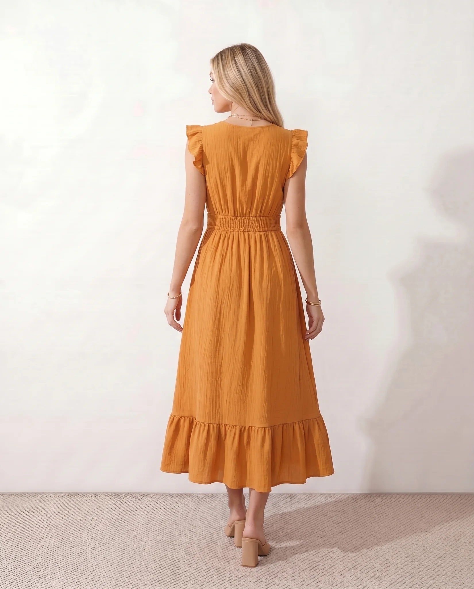 Mirtha Low Back Ruffle Detail Midi Dress in Orange — back view
