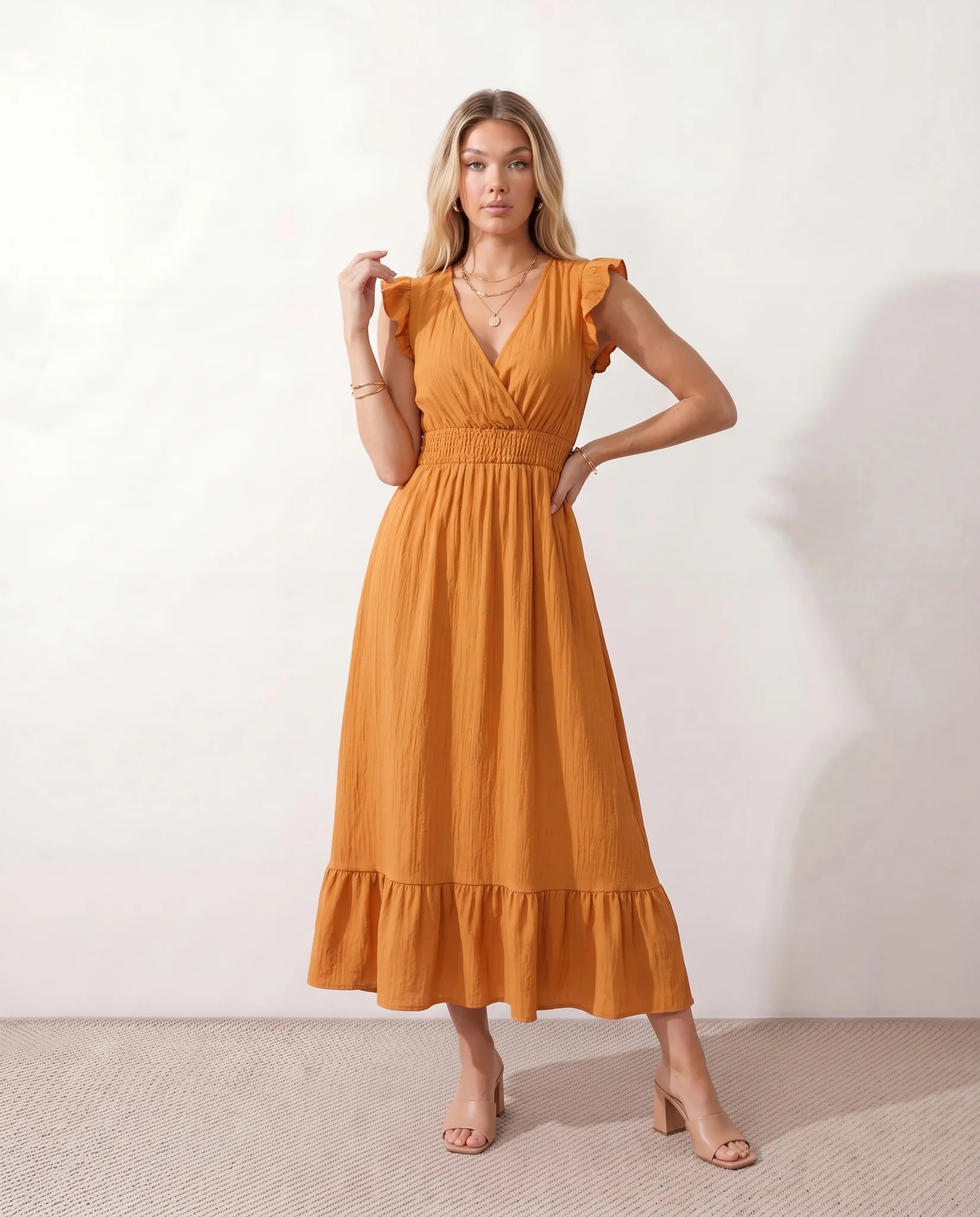 Mirtha Low Back Ruffle Detail Midi Dress in Orange — front view