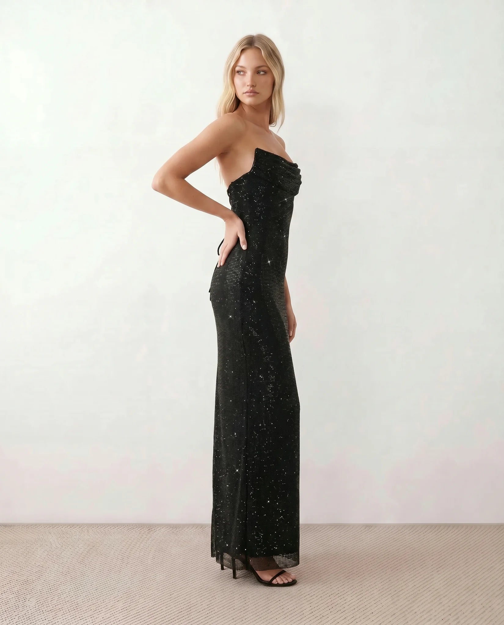 Izabela Sequined Strapless Maxi Dress in Black — side view