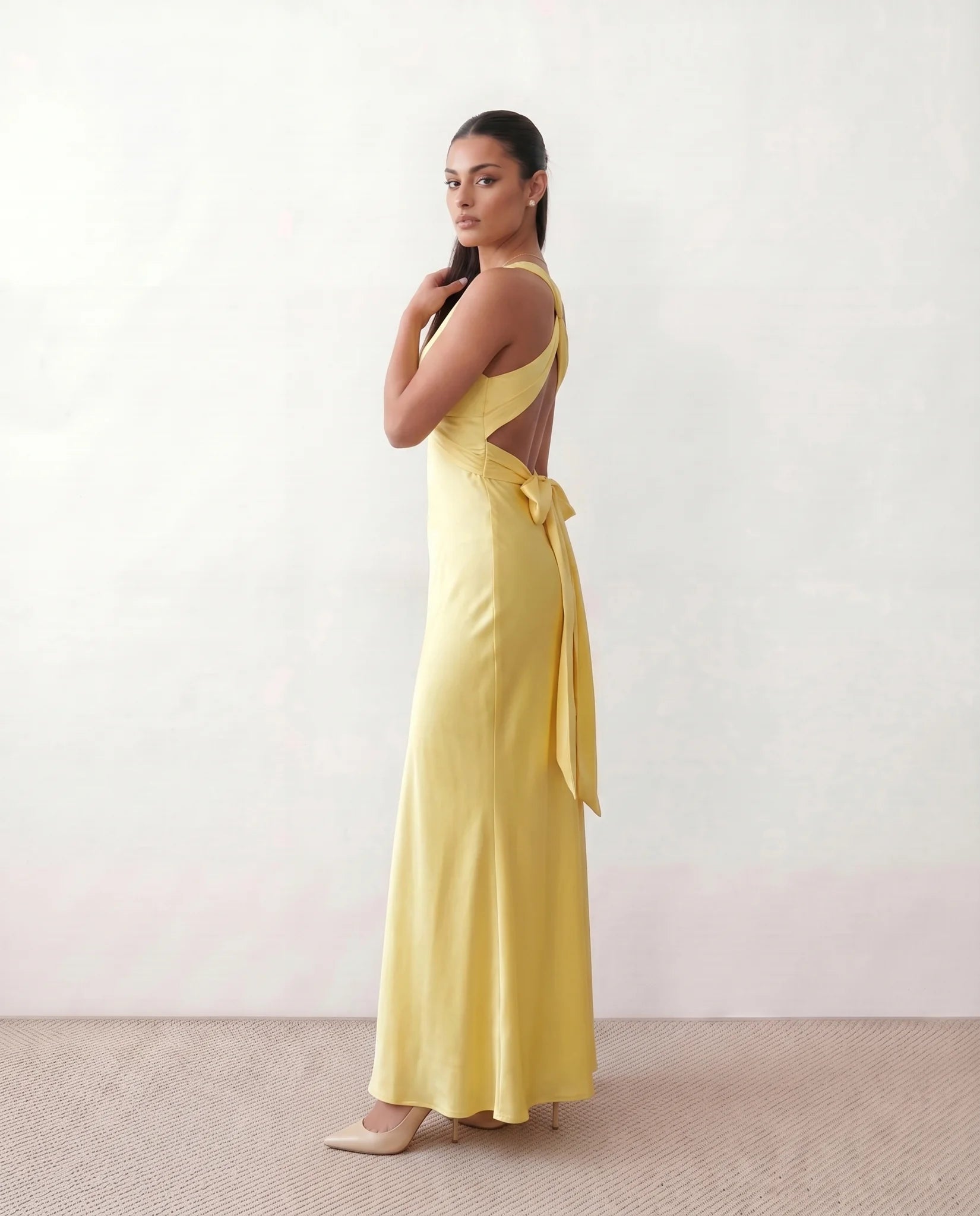 Vendula Backless Bow Detail Maxi Dress in Yellow — side view