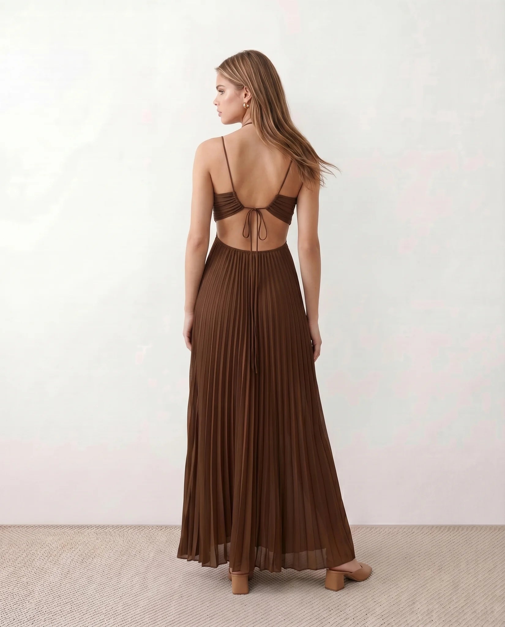 Estella Pleated Strapless Maxi Dress in Brown — back view