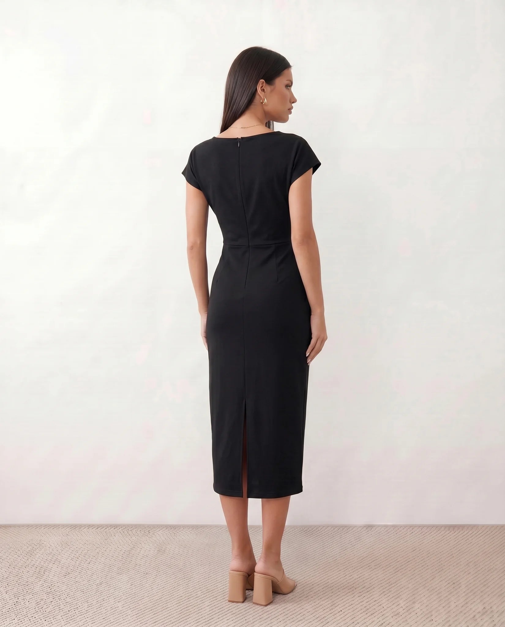 Eugenia Draped Midi Dress in Black — back view