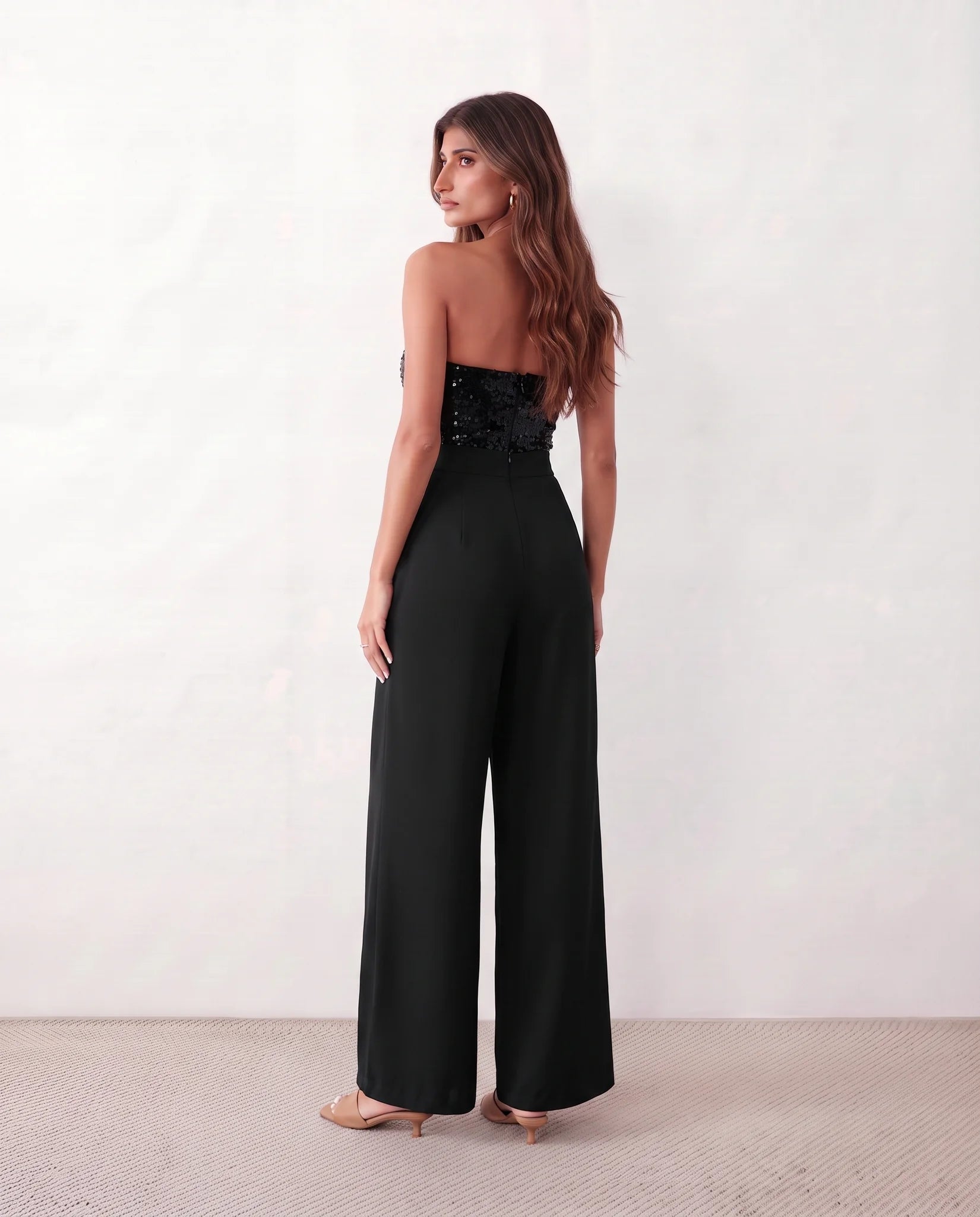 Rodica Sequined Strapless Jumpsuit in Black — back view