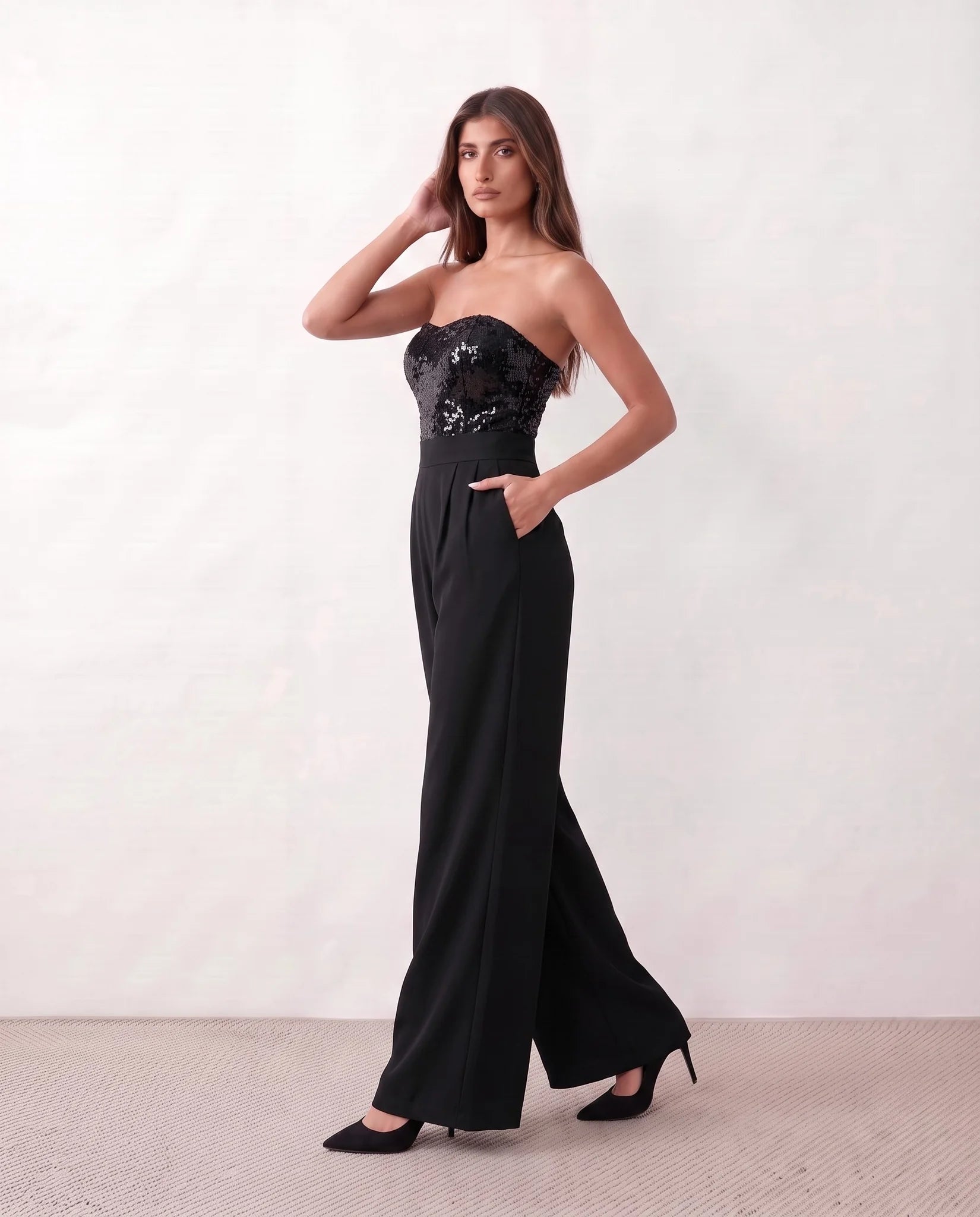 Rodica Sequined Strapless Jumpsuit in Black — side view