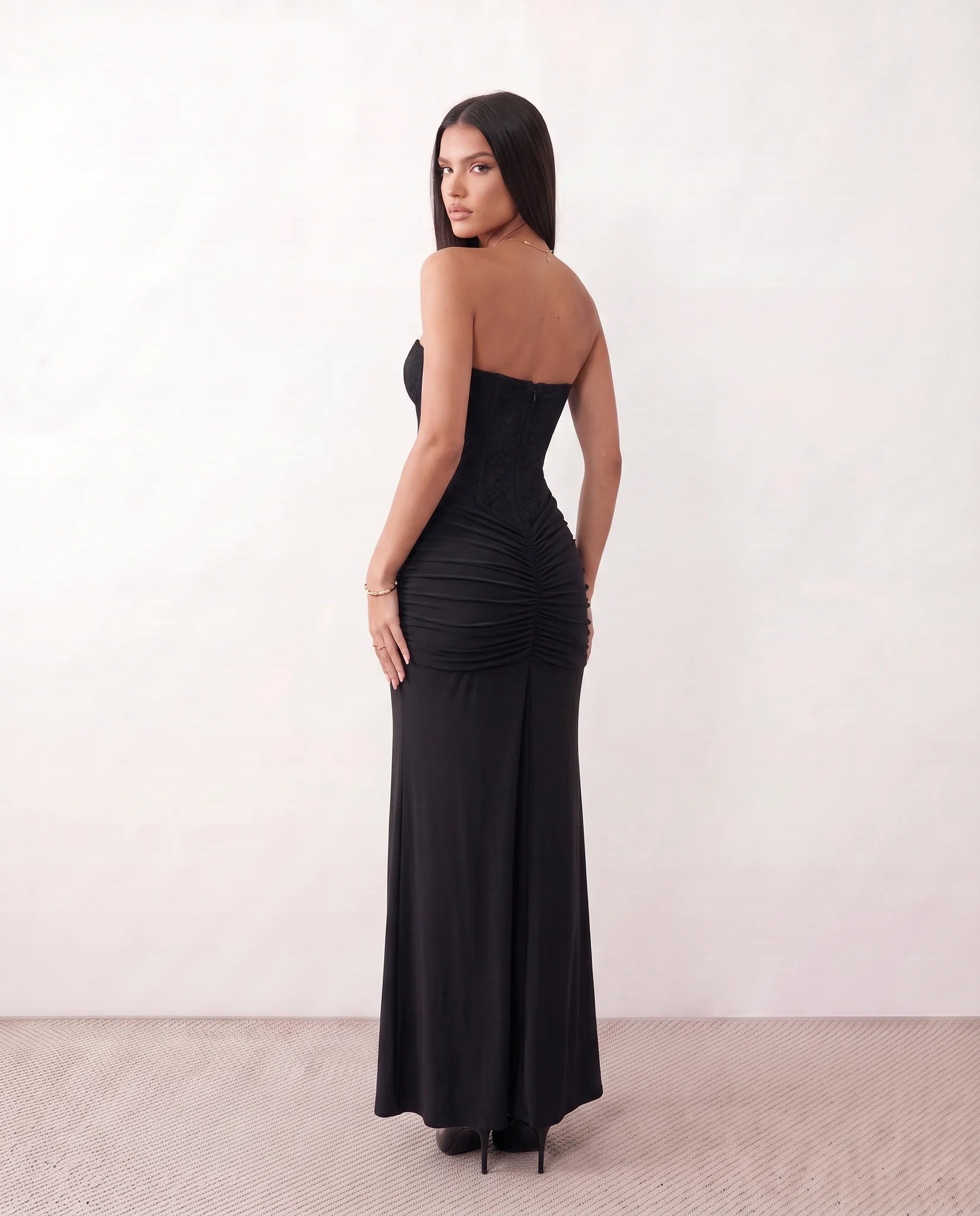 Ulrika Sequined Strapless Maxi Dress in Black — back view